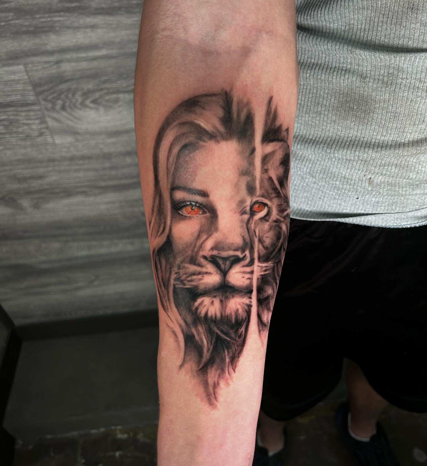 Lion realism tattoo on the forearm by Kipling Mcclellan