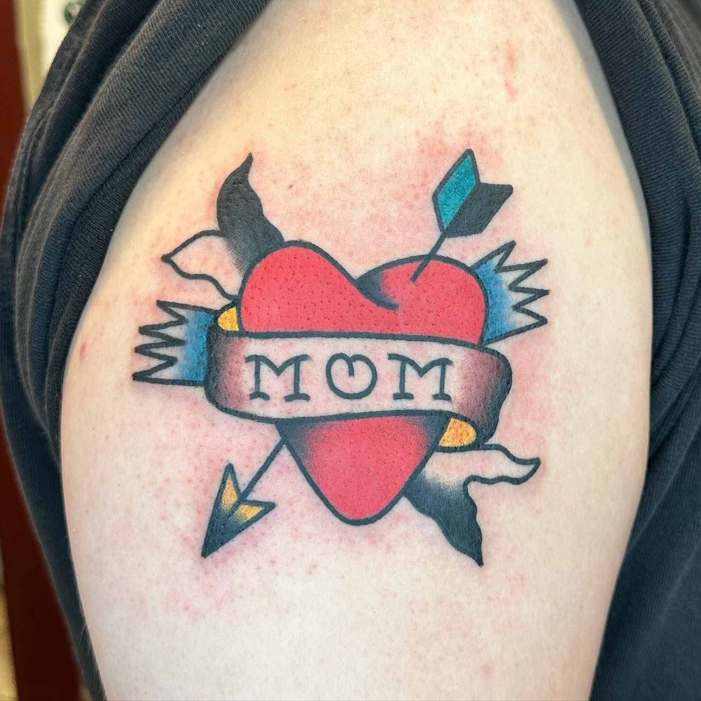 Heart with arrow American traditional tattoo on the shoulder by Keon Ostby, Tempe, Arizona