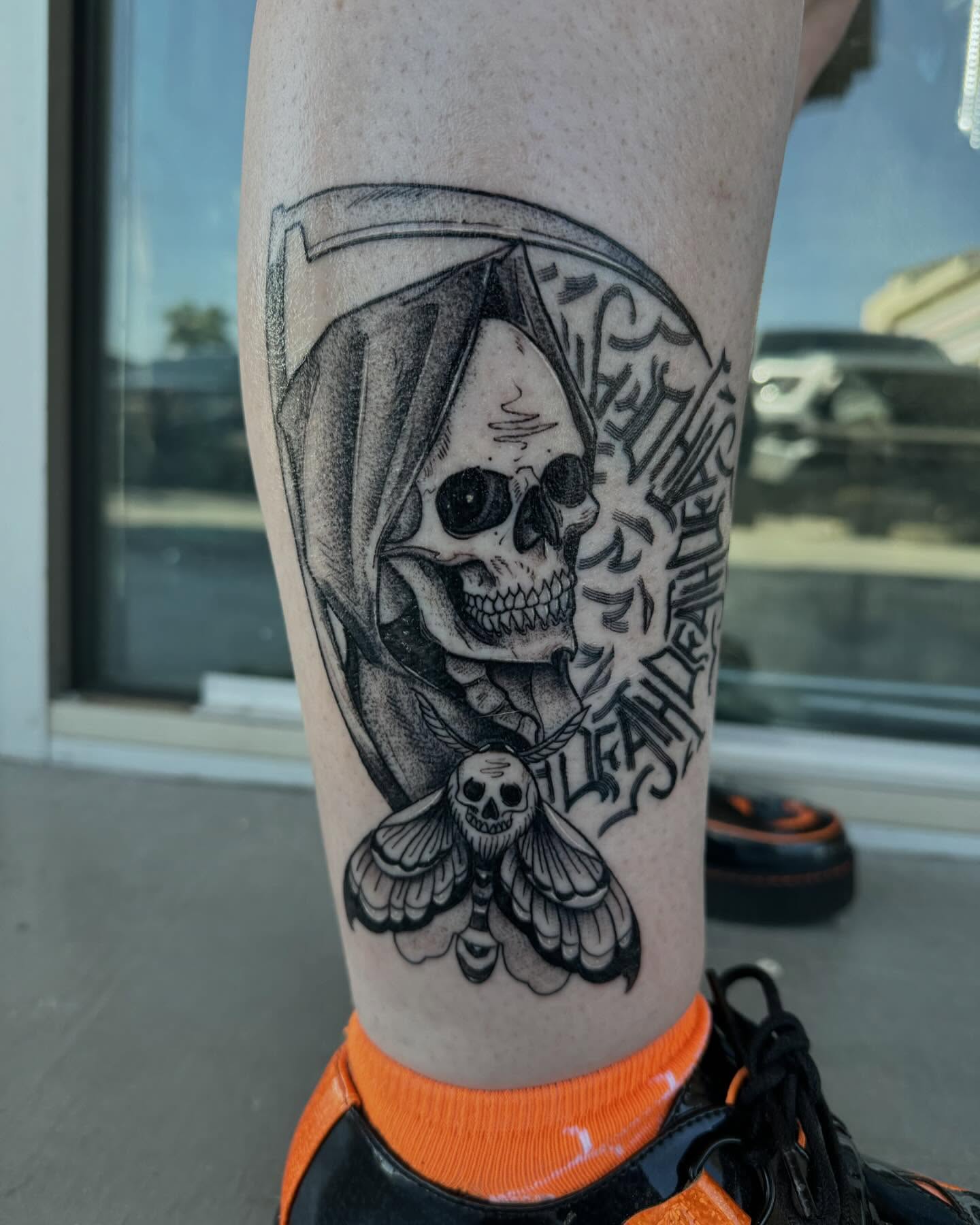 Grim reaper moth realism tattoo on the forearm by Kyle Haitch, Las Vegas, Nevada