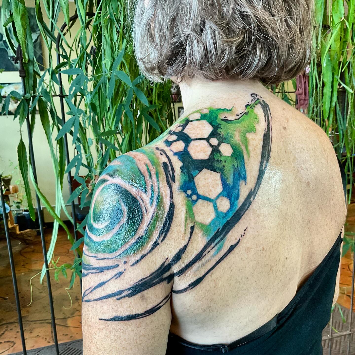 Tattoo by @jacoba.kaufman — geometric, watercolor