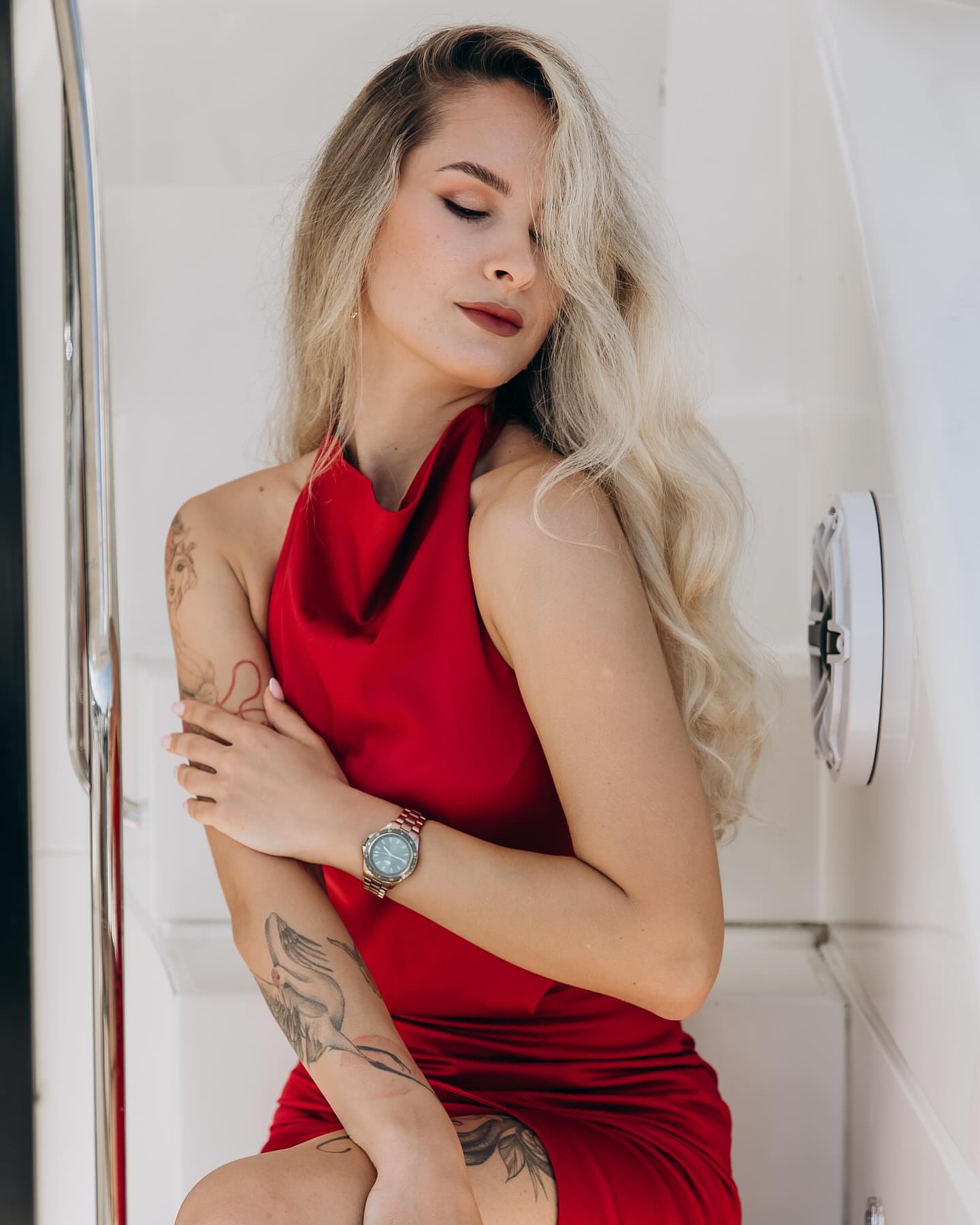 Red dress American traditional tattoo on the torso by Tattoo Yulia Kononenko