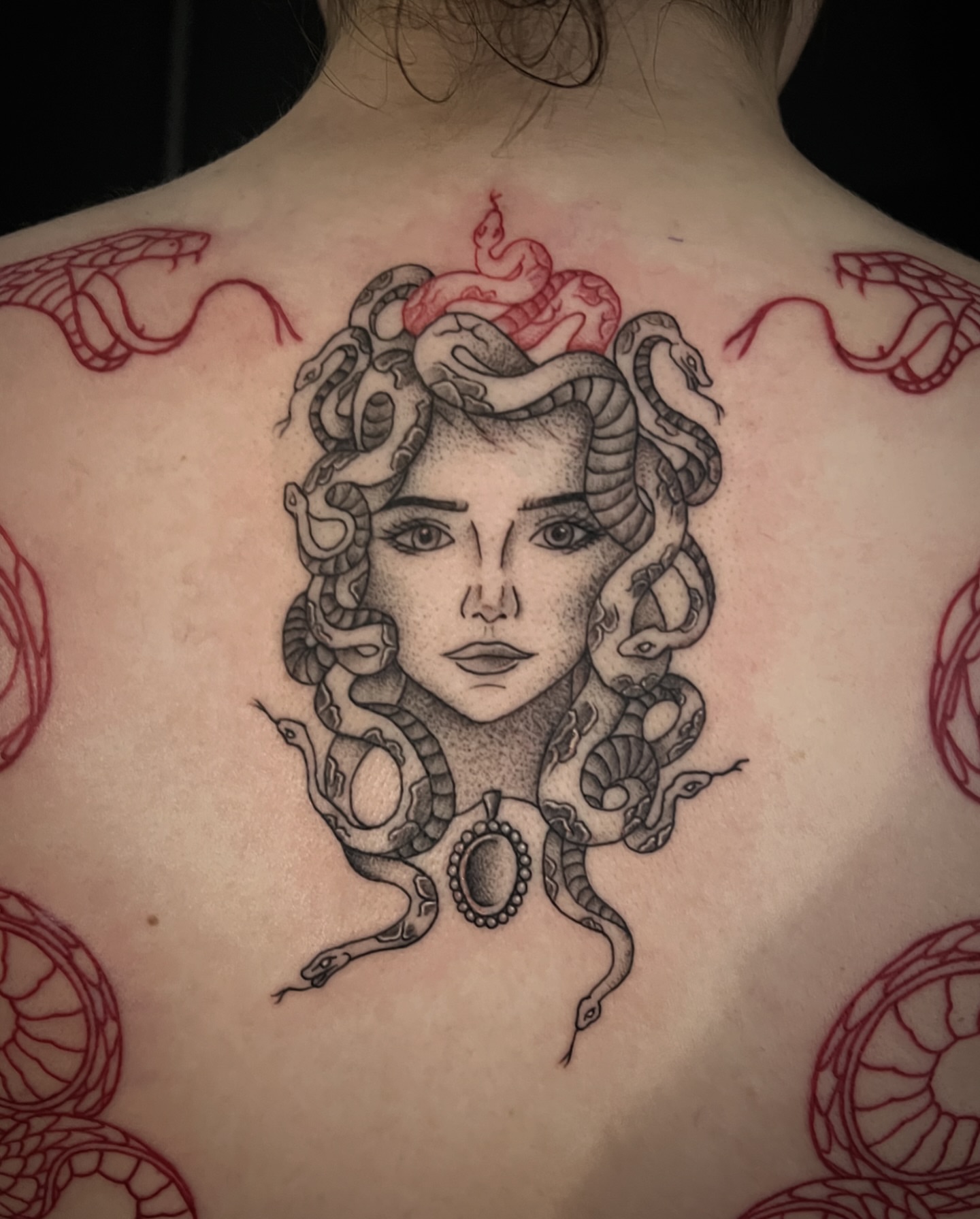 Medusa dotwork tattoo on the back by Iraymi Beltran