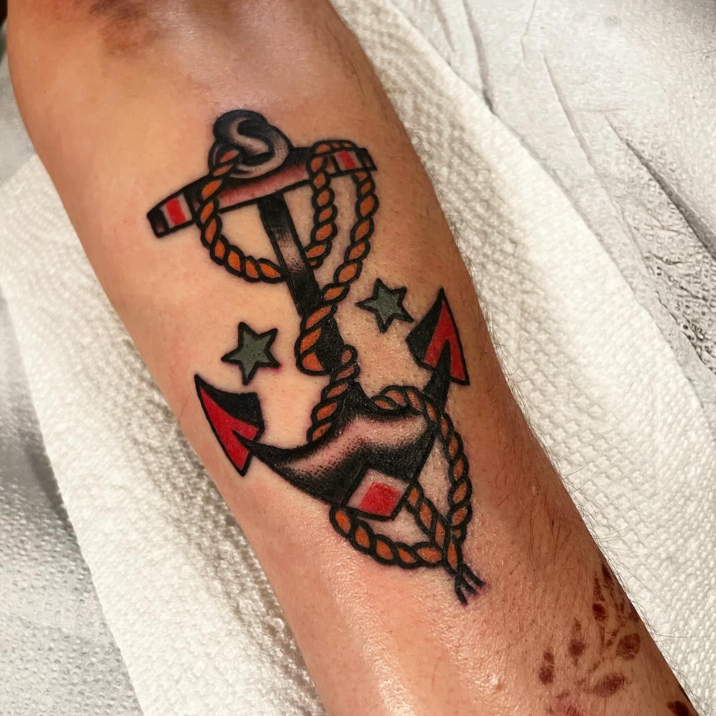 Anchor American traditional tattoo on the forearm by Mike Hudgins