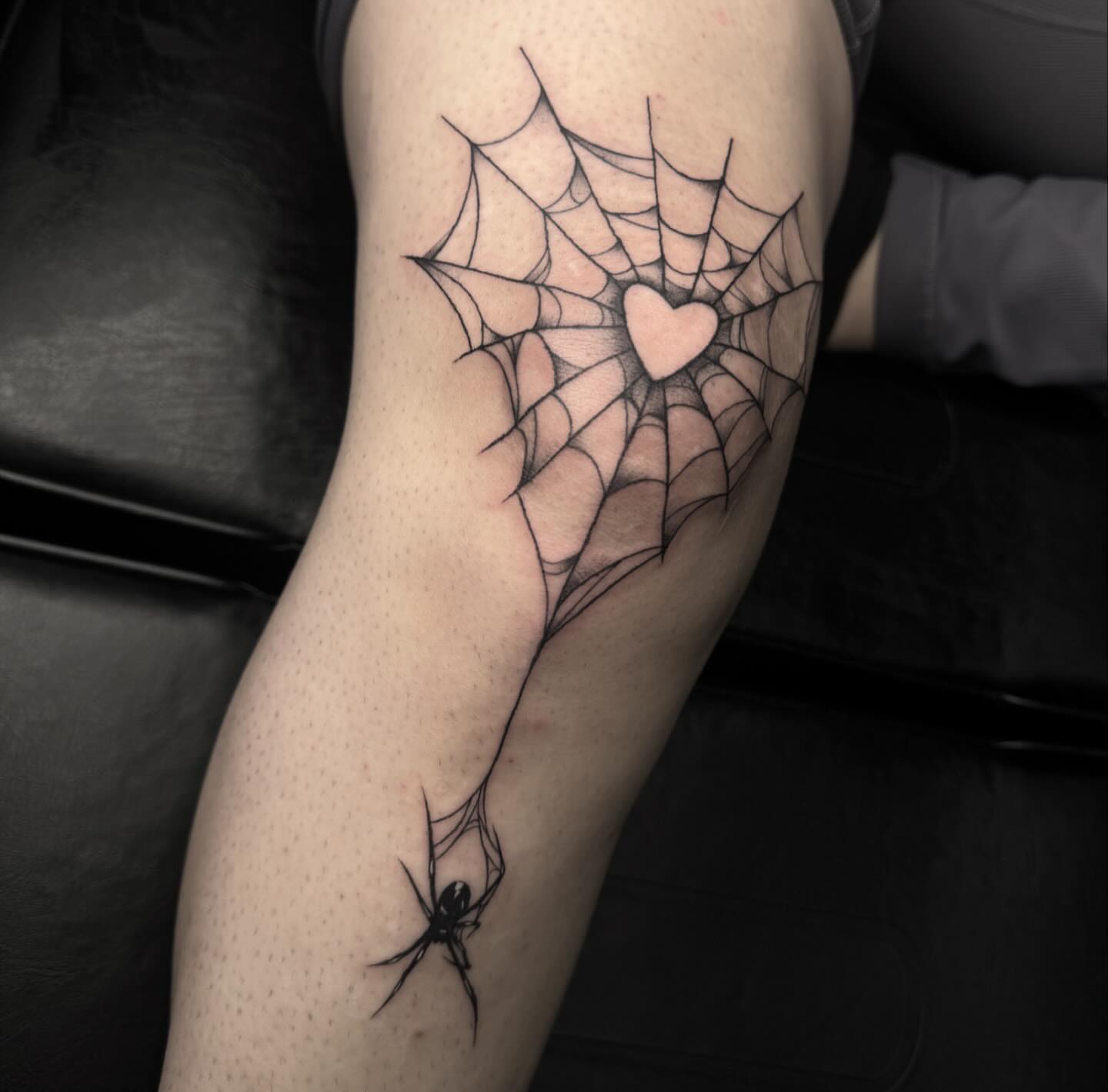 Spider web with heart black and grey tattoo on the forearm by โโฎโ๐ถ๐๐ฝ๐๐๐ู เฃชโญ las vegas tattoo artist