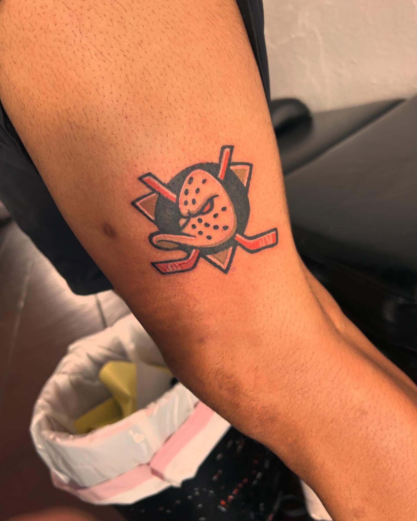 Hockey mask American traditional tattoo on the forearm by Felix perez (Tattooer)