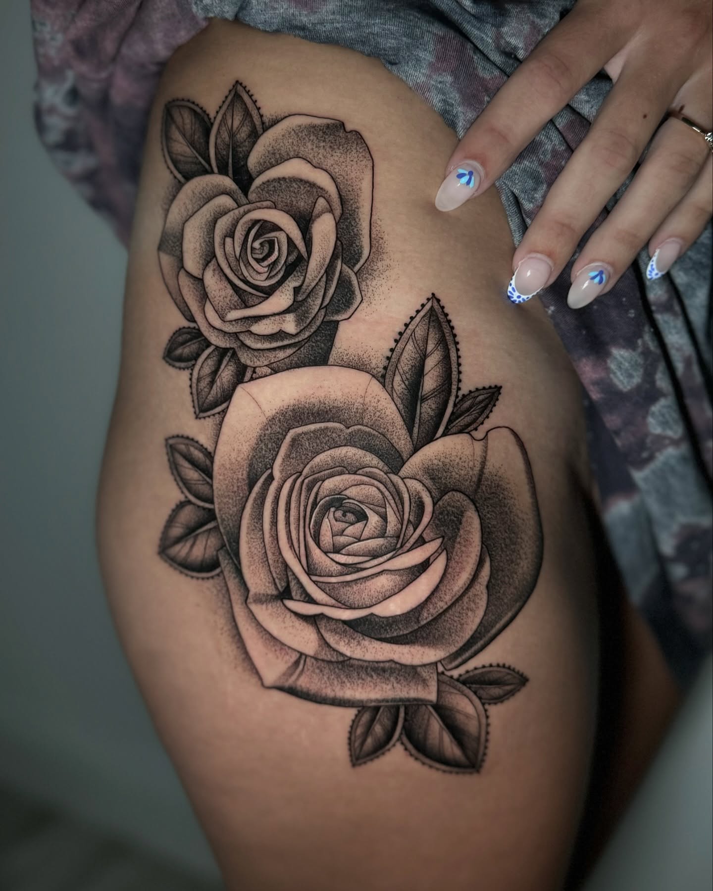 Roses dotwork tattoo on the thigh by Caroline Yurek