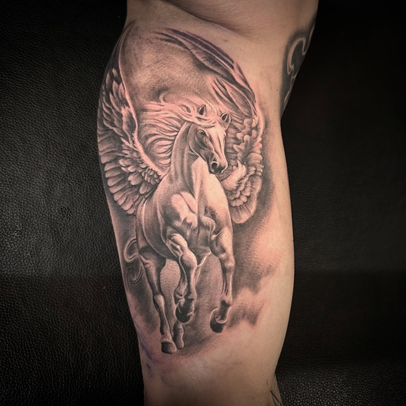 Pegasus realism tattoo on the forearm by Tattoo Artist - the Goat