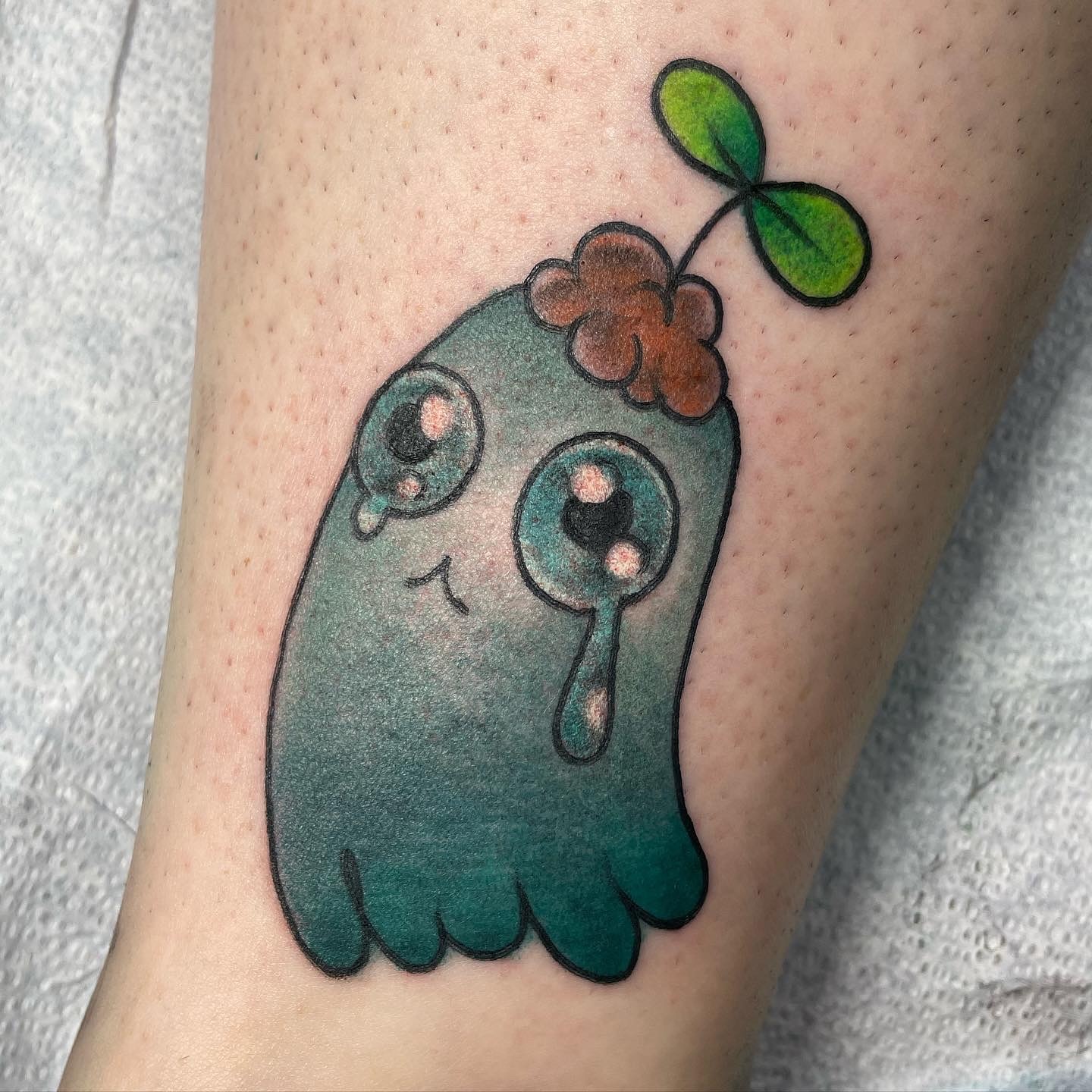 Ghost with plant dotwork tattoo on the forearm by 𝙹𝚎𝚗 ♡︎
