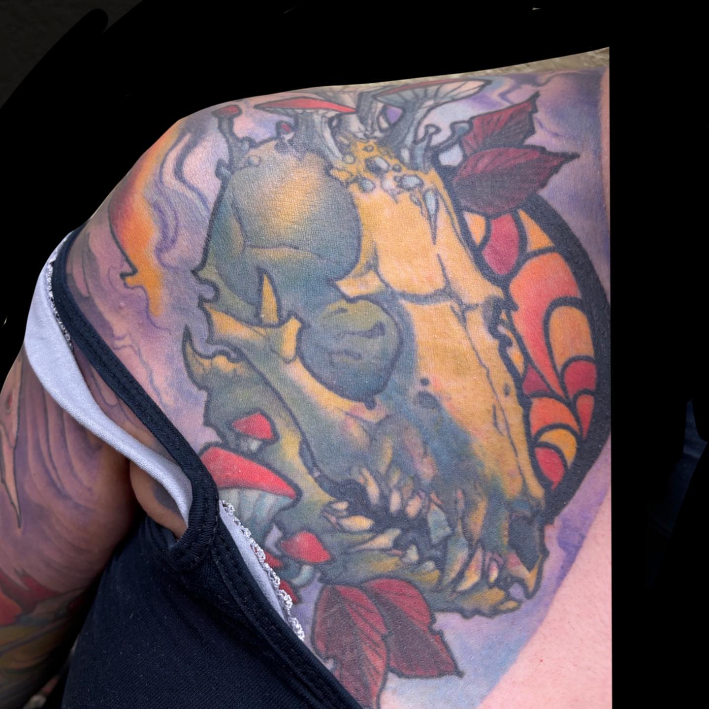 Monster tattoo on the shoulder by Rene Chavira