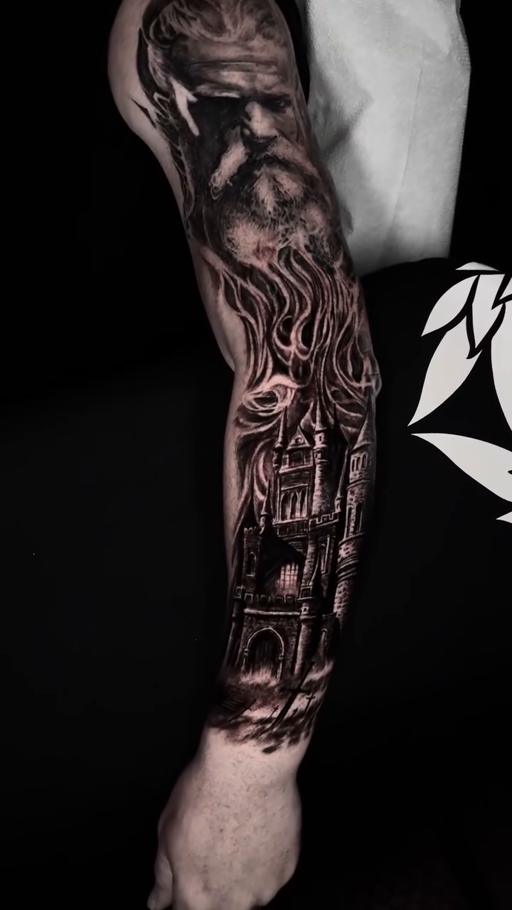 Viking portrait with castle and fire realism tattoo by Cory James