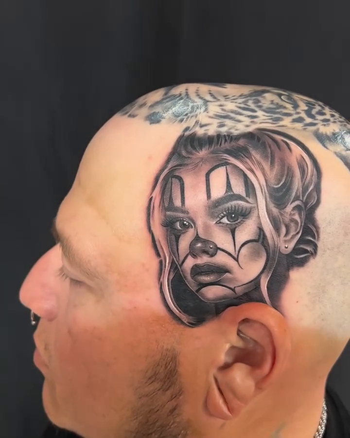 Woman with clown makeup realism tattoo by Thomas Conard