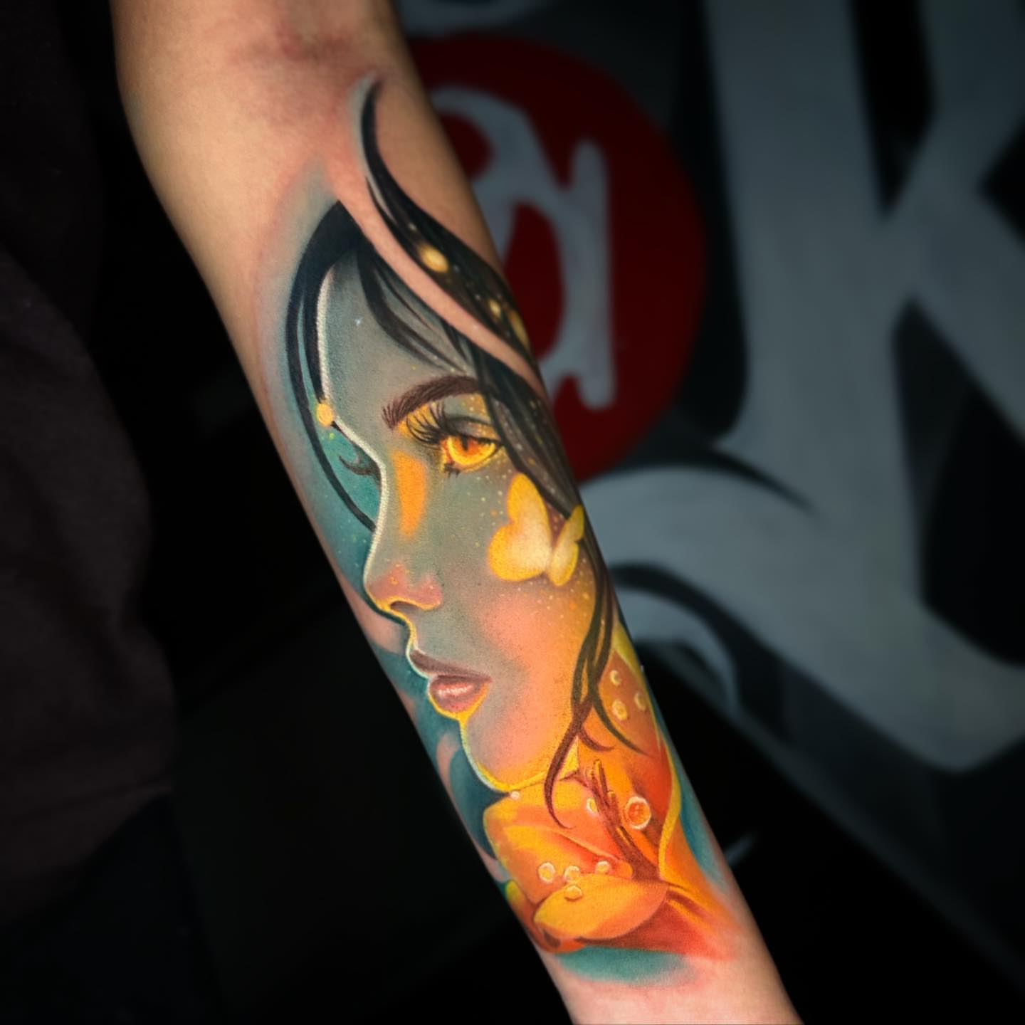 Woman's profile realism tattoo on the forearm by audi