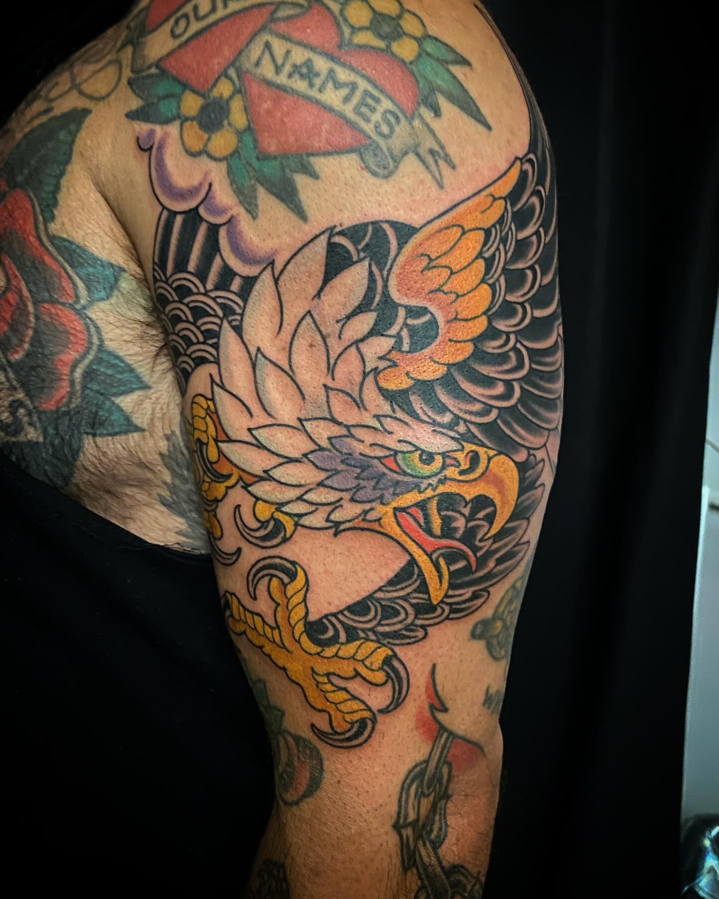 Eagle American traditional tattoo on the upper arm by Adam Warmerdam, Los Angeles, California
