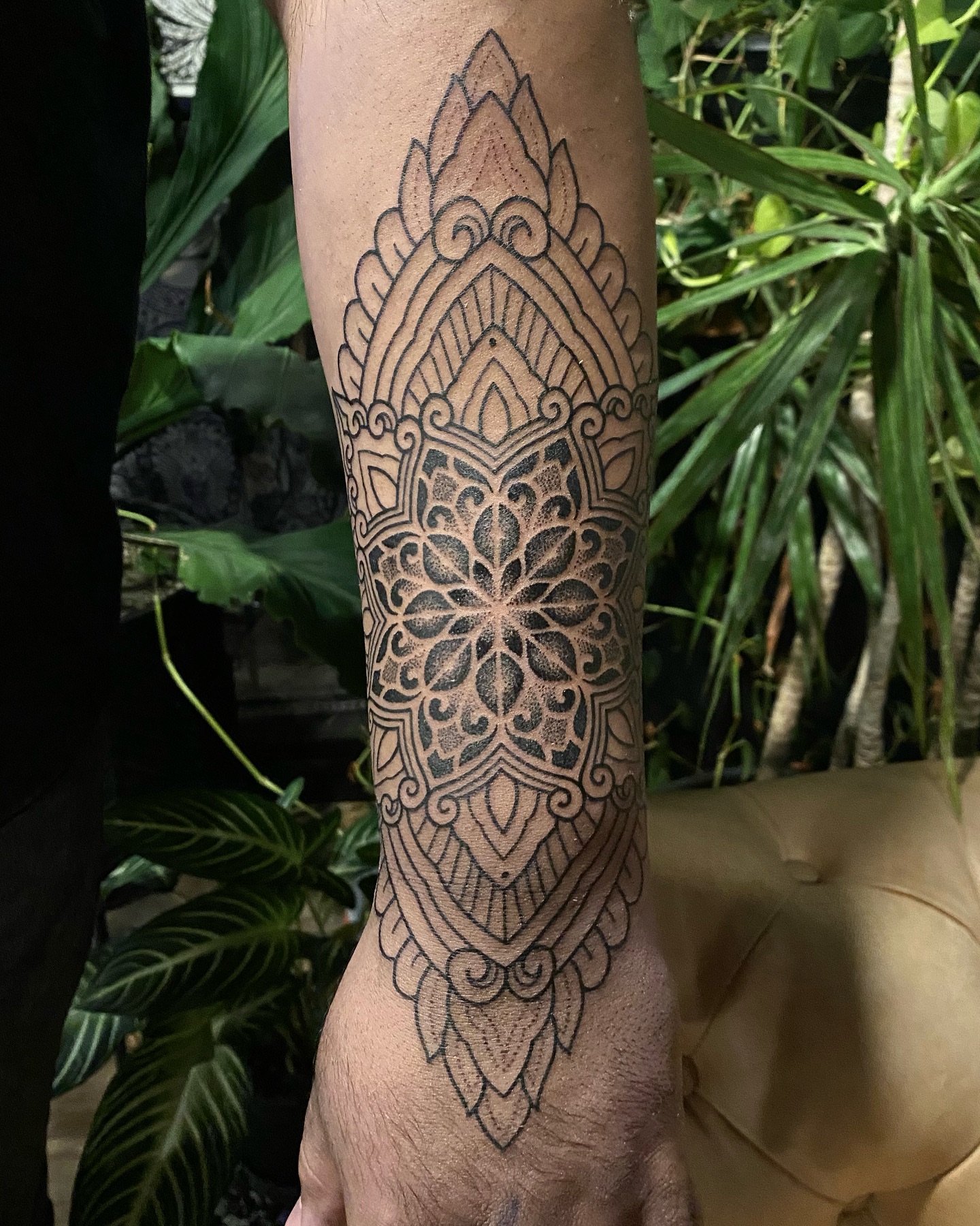 Mandala geometric tattoo on the forearm by Rose Ulinski