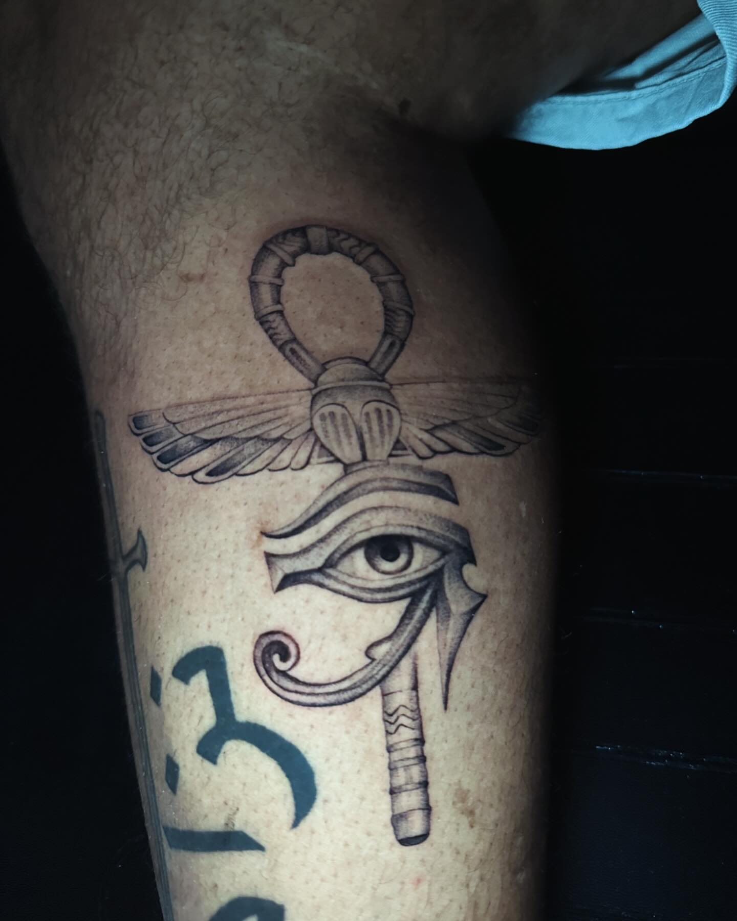 Eye of horus black and grey tattoo on the forearm by ⠀Joey Rosado