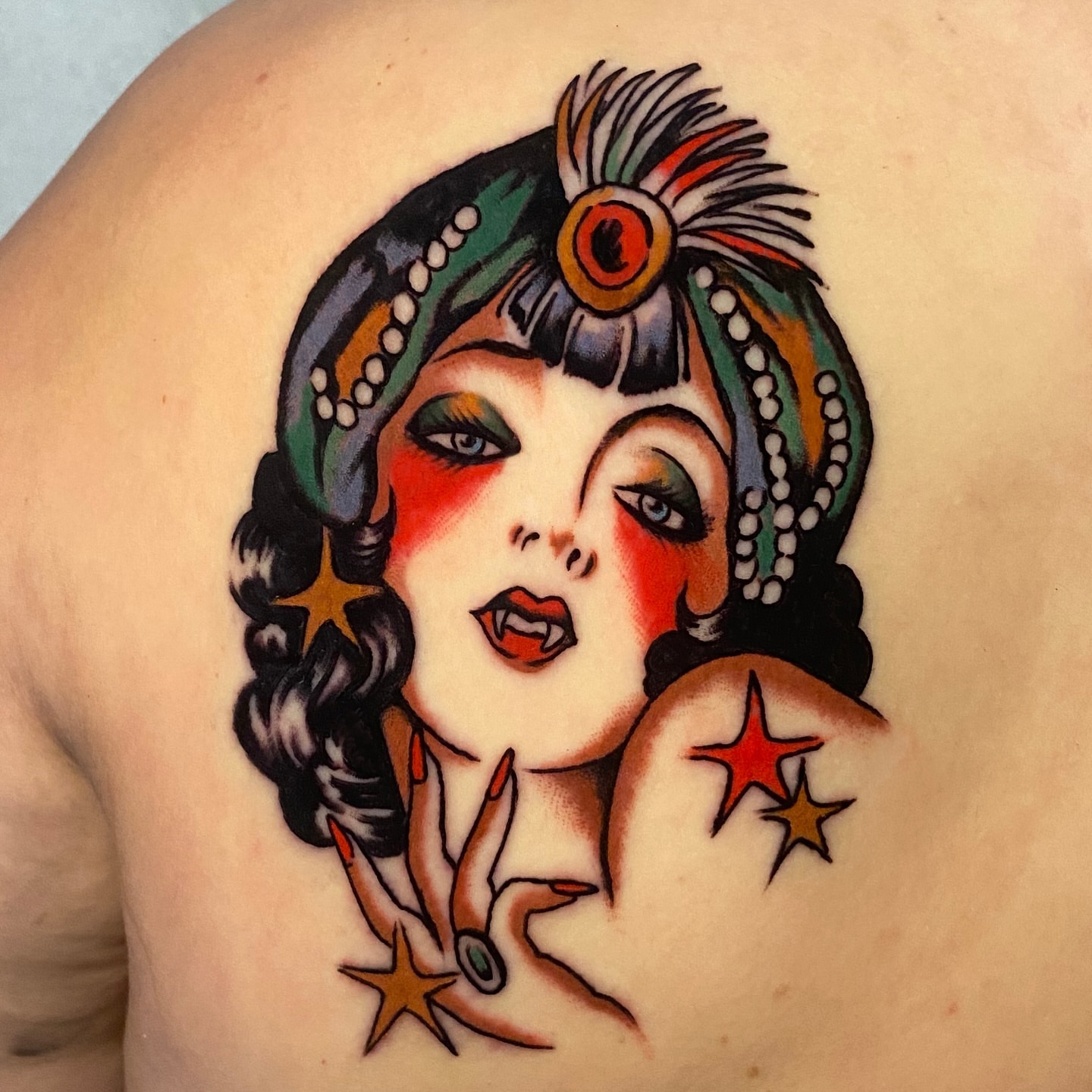 Flapper girl American traditional tattoo on the shoulder by Haley Tucker, Sebastopol, California