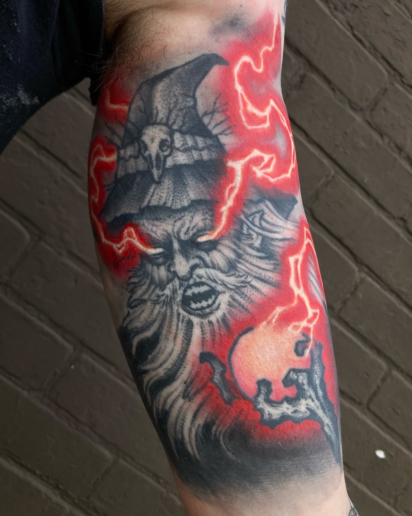 Grim reaper realism tattoo on the forearm by Griffin Benson