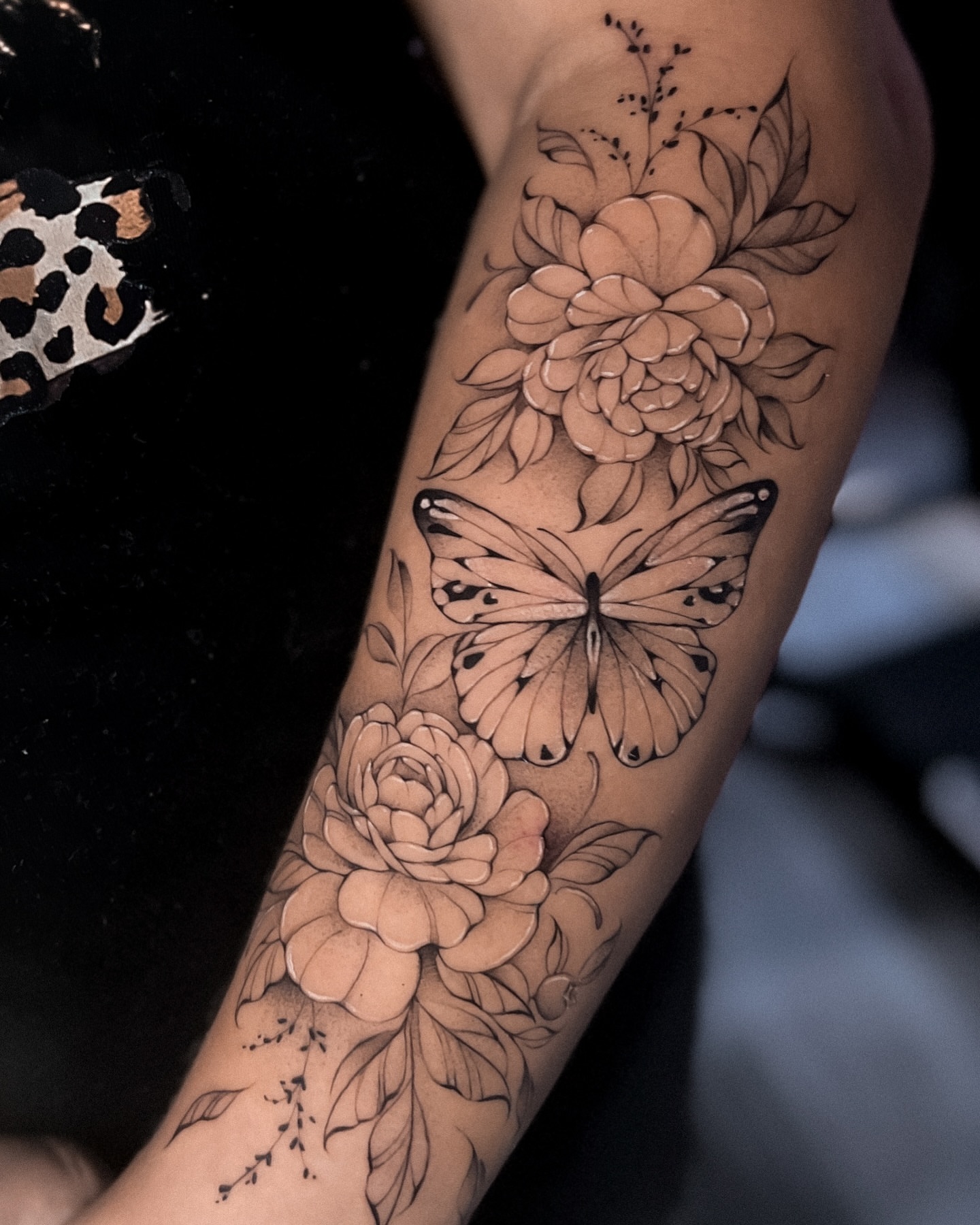 Butterfly and flowers realism tattoo on the forearm by πππΉππππππππππππ
