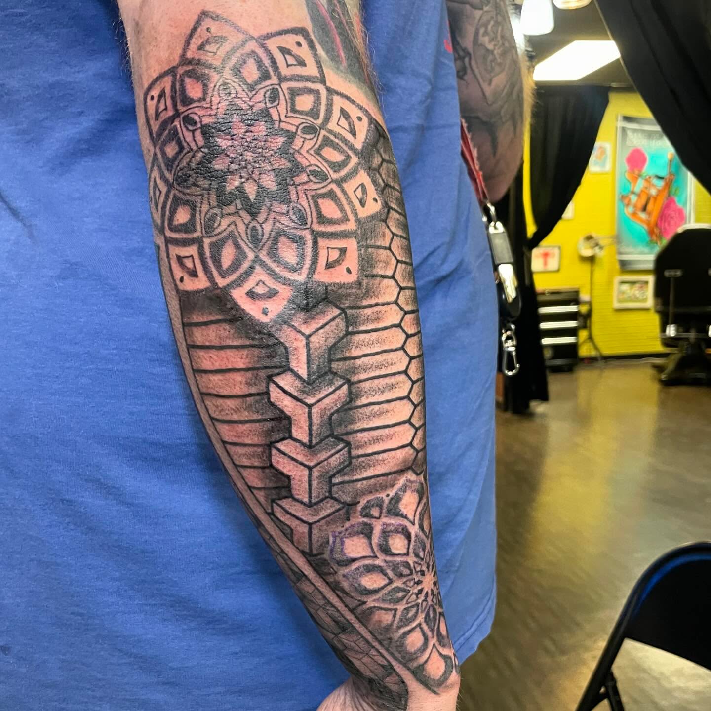 Geometric pattern geometric tattoo on the forearm by Evan