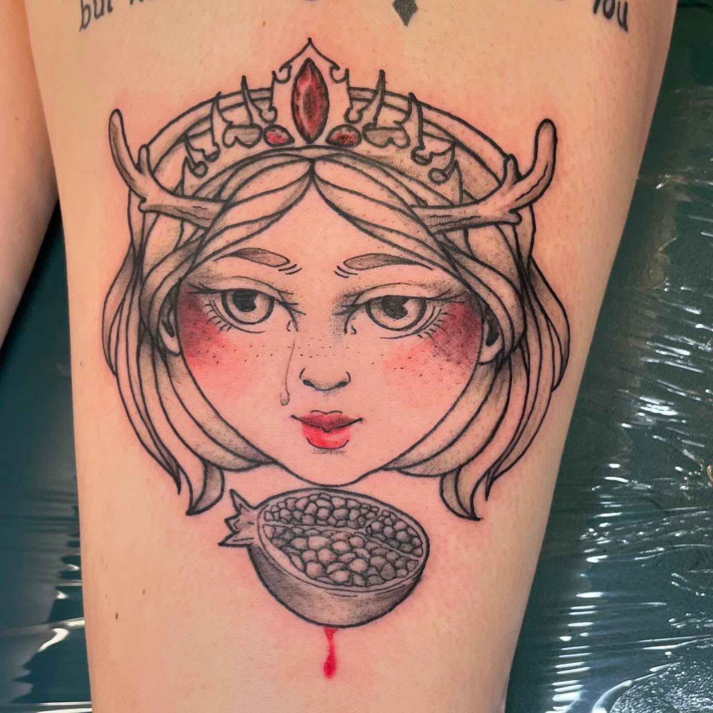 Woman with crown realism tattoo on the thigh by Evan