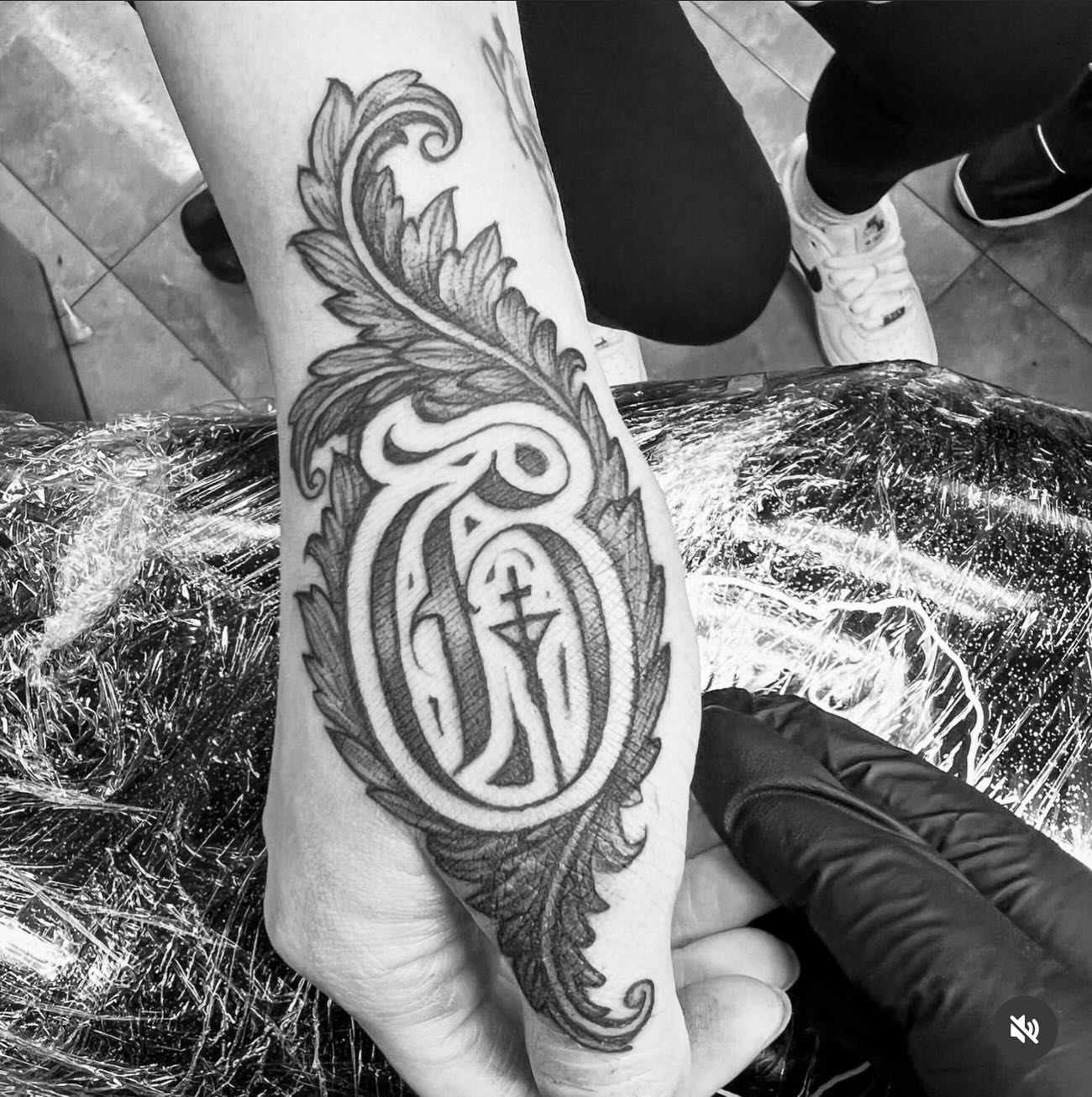 Tattoo by @twicetattoos β lettering_script, ornamental