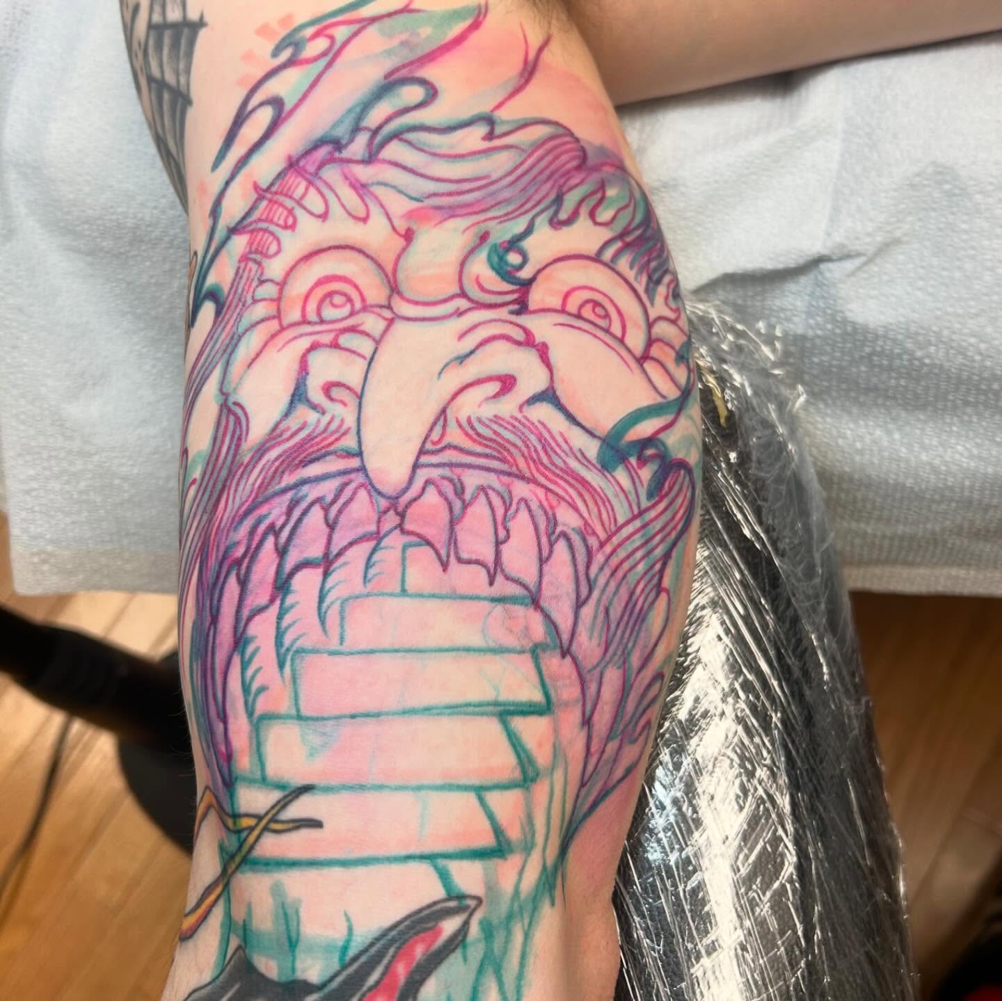 Bearded man with waves new school tattoo on the forearm by Craig Gardyan