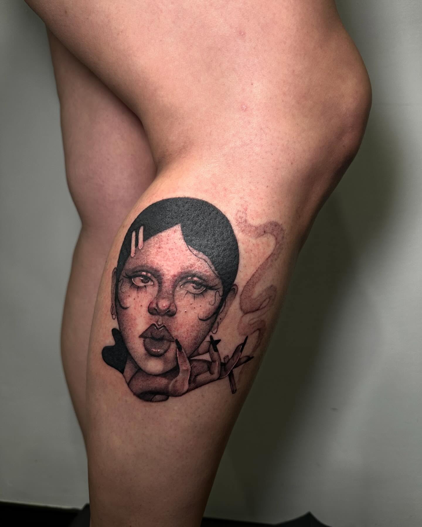 Abstract face dotwork tattoo on the thigh by @piinkywabbiit, Roselle Park, New Jersey