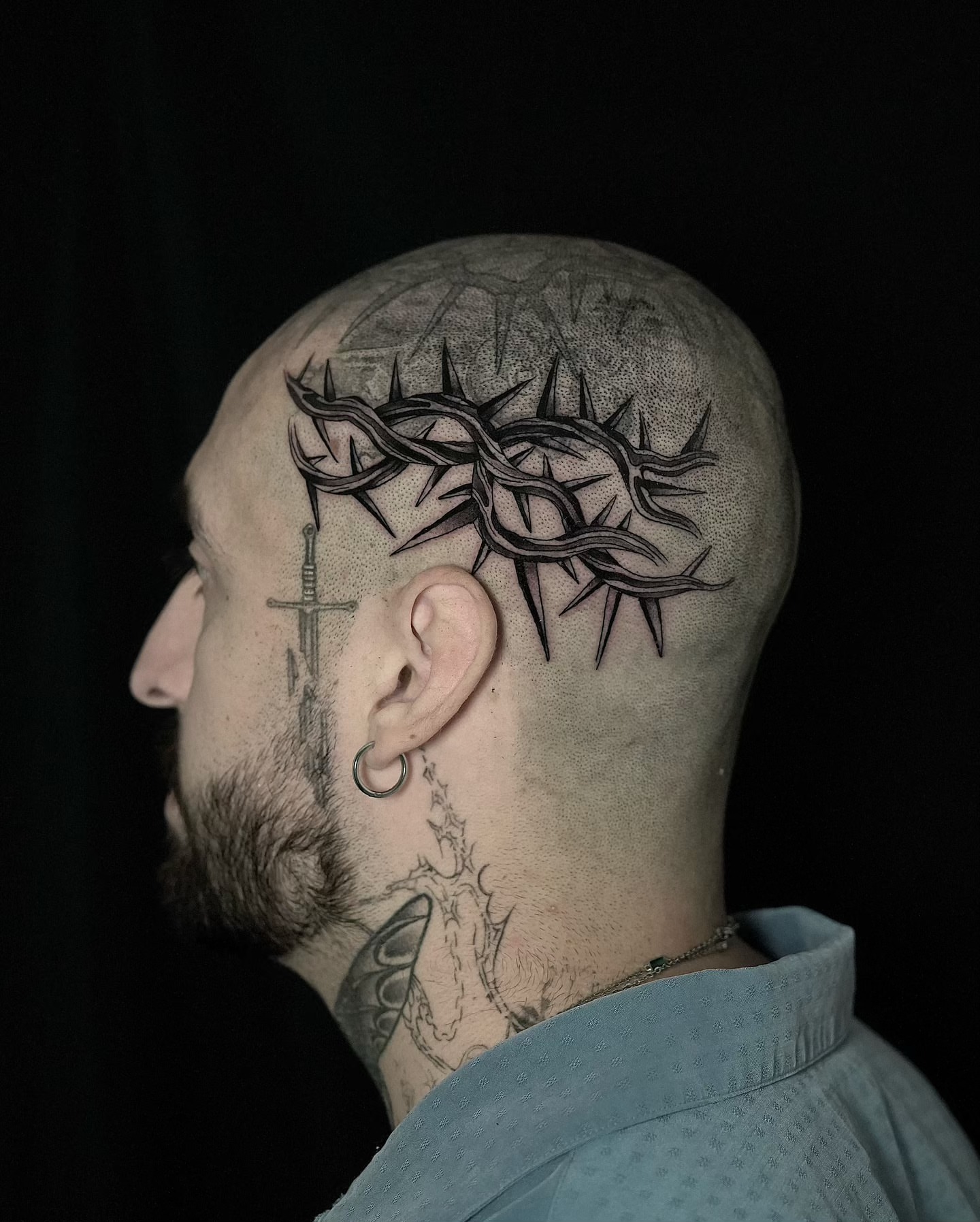 Crown of thorns black and grey tattoo on the head by Fine line tattoo San Diego, San Diego, California