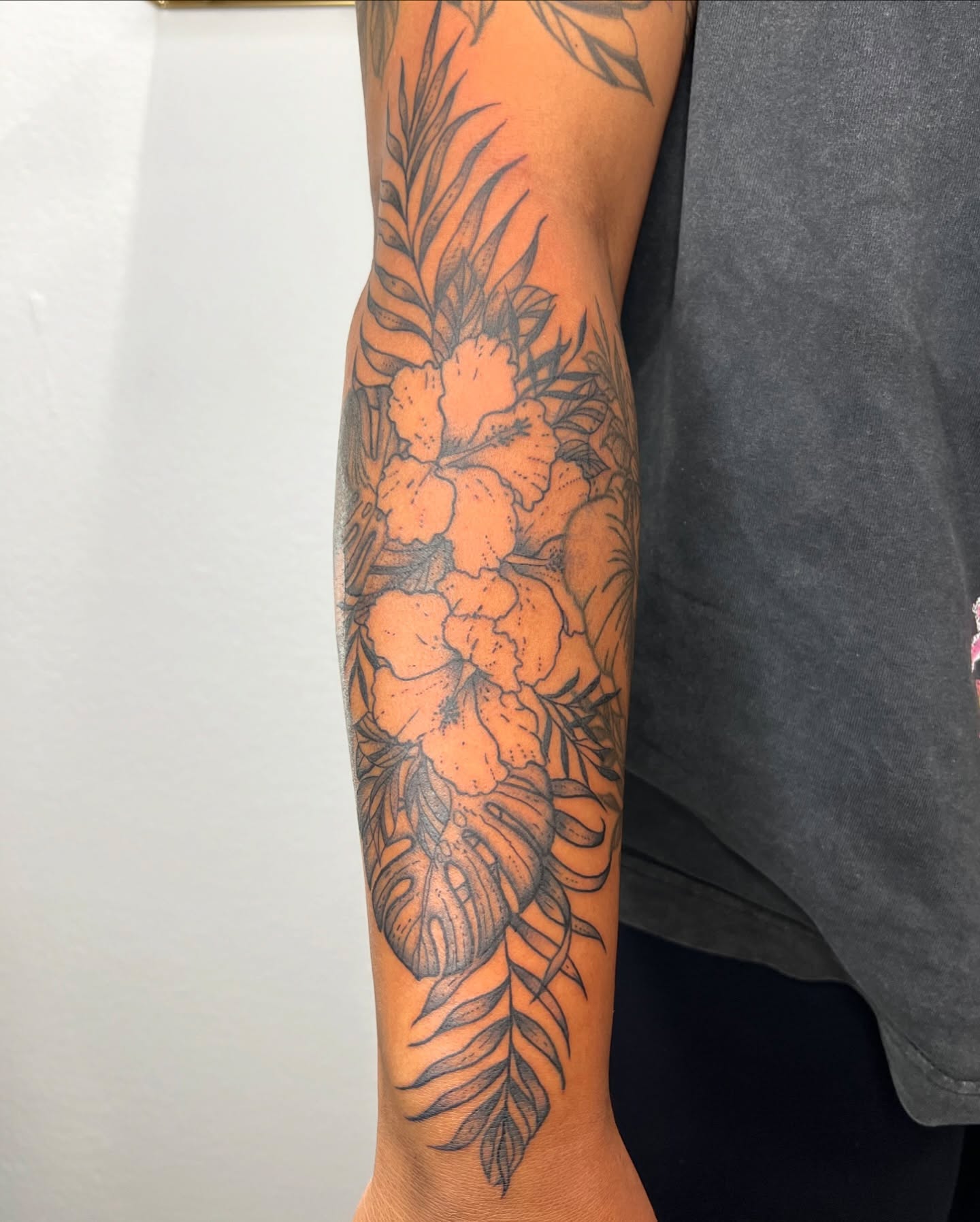 Floral arrangement black and grey tattoo on the forearm by ✨BADJASS the tattoo artist✨