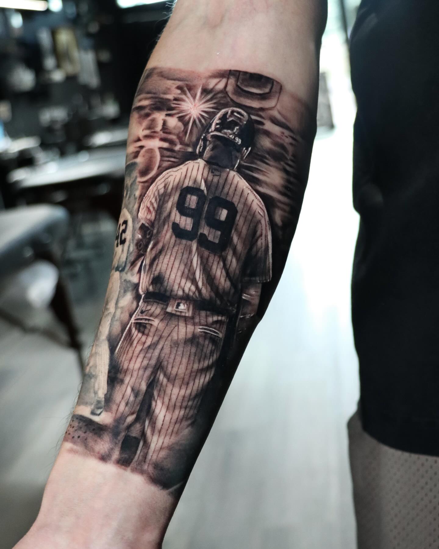 Baseball player realism tattoo on the forearm by Alex Suarez