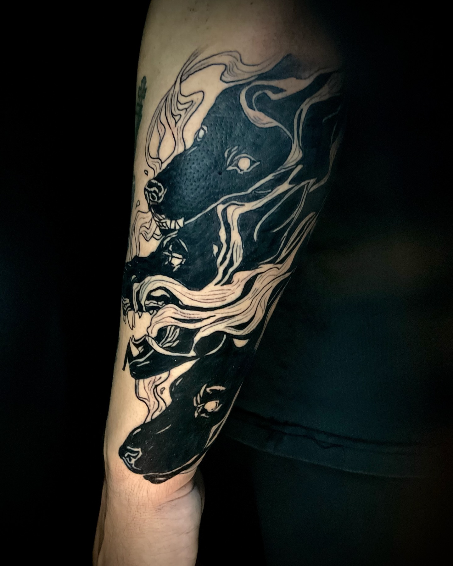 Abstract face dotwork tattoo on the forearm by 𝕷𝖚𝖈𝖎𝖉
