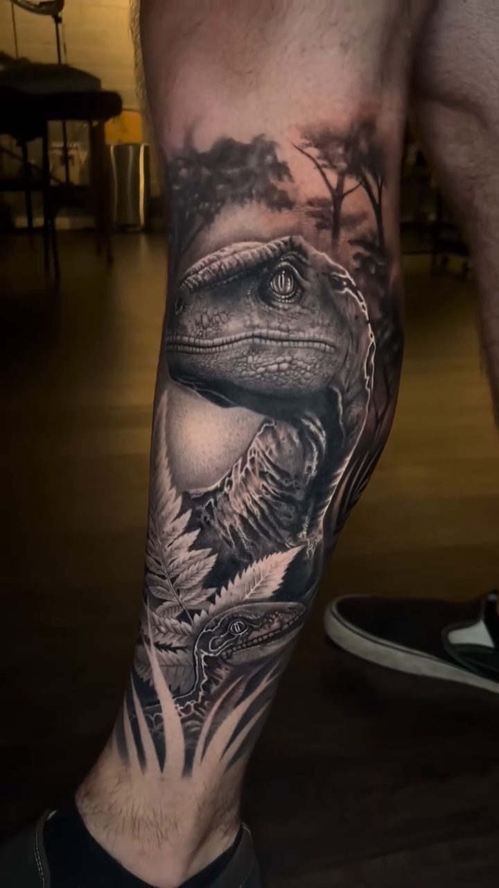 Dinosaur leg tattoo realism tattoo by Ana Reyes