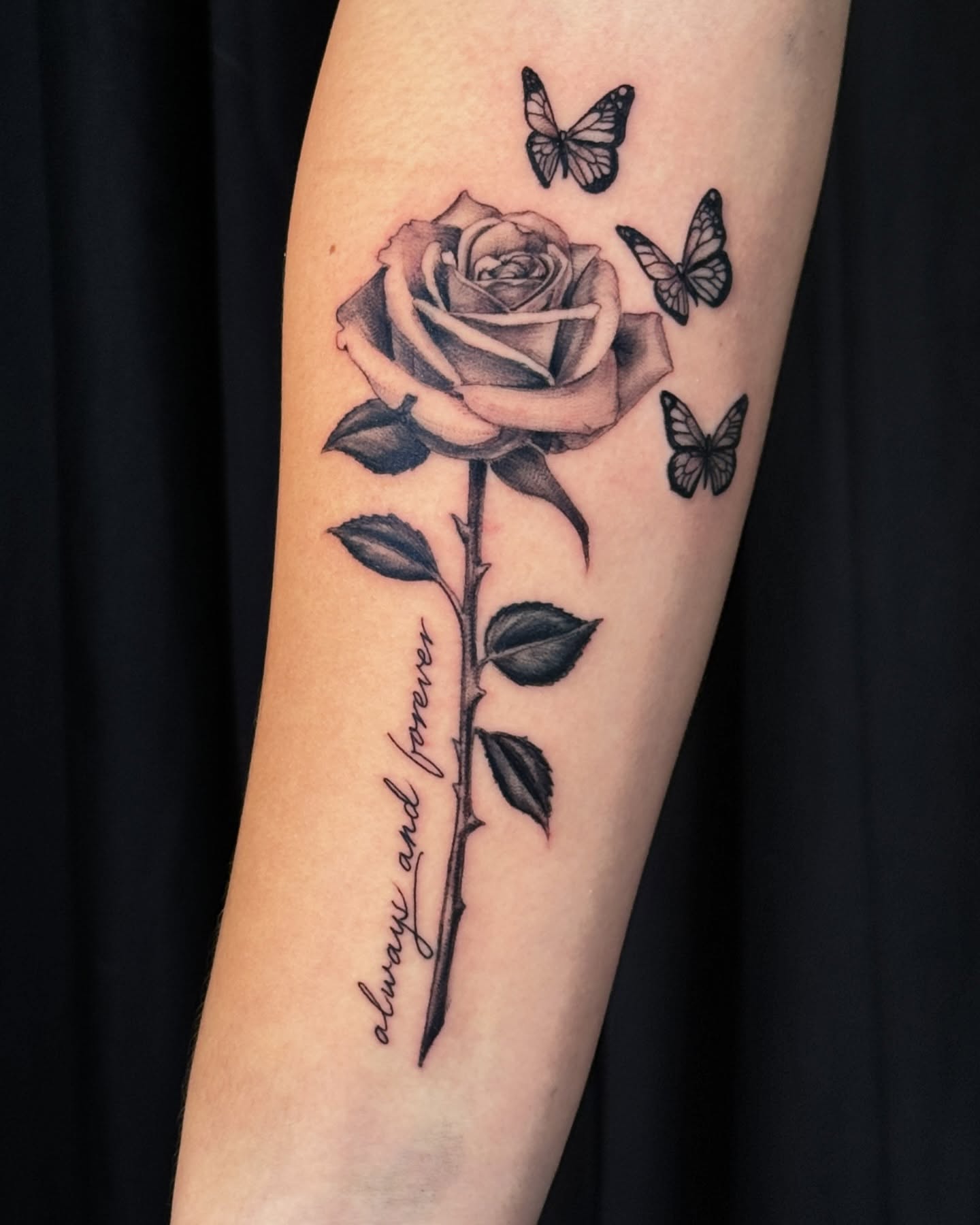 Rose and butterflies realism tattoo on the forearm by Paul Jack II ⚜️ Tattoo Artist ⚜️Atlanta