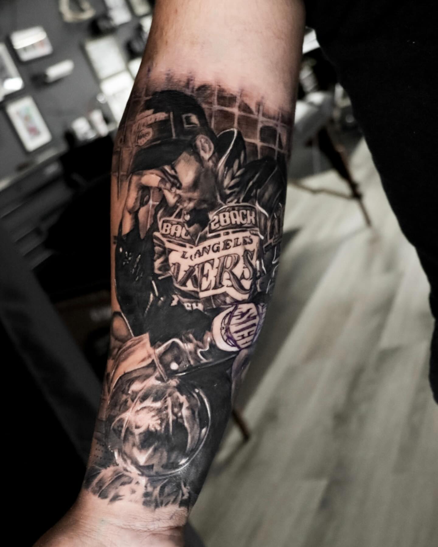 Basketball player realism tattoo on the forearm by Alex Suarez