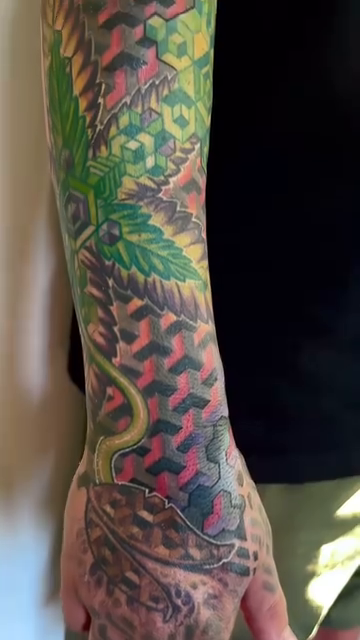 Cannabis leaf and geometric patterns geometric tattoo by Mike Cole