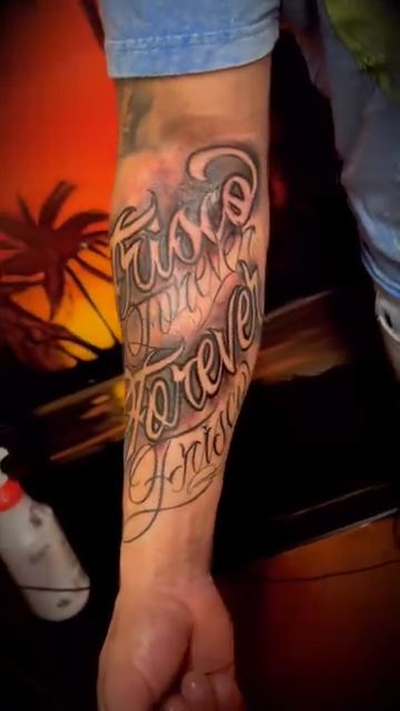 Tattoo by @bloodmoney_tattoos — lettering_script, chicano