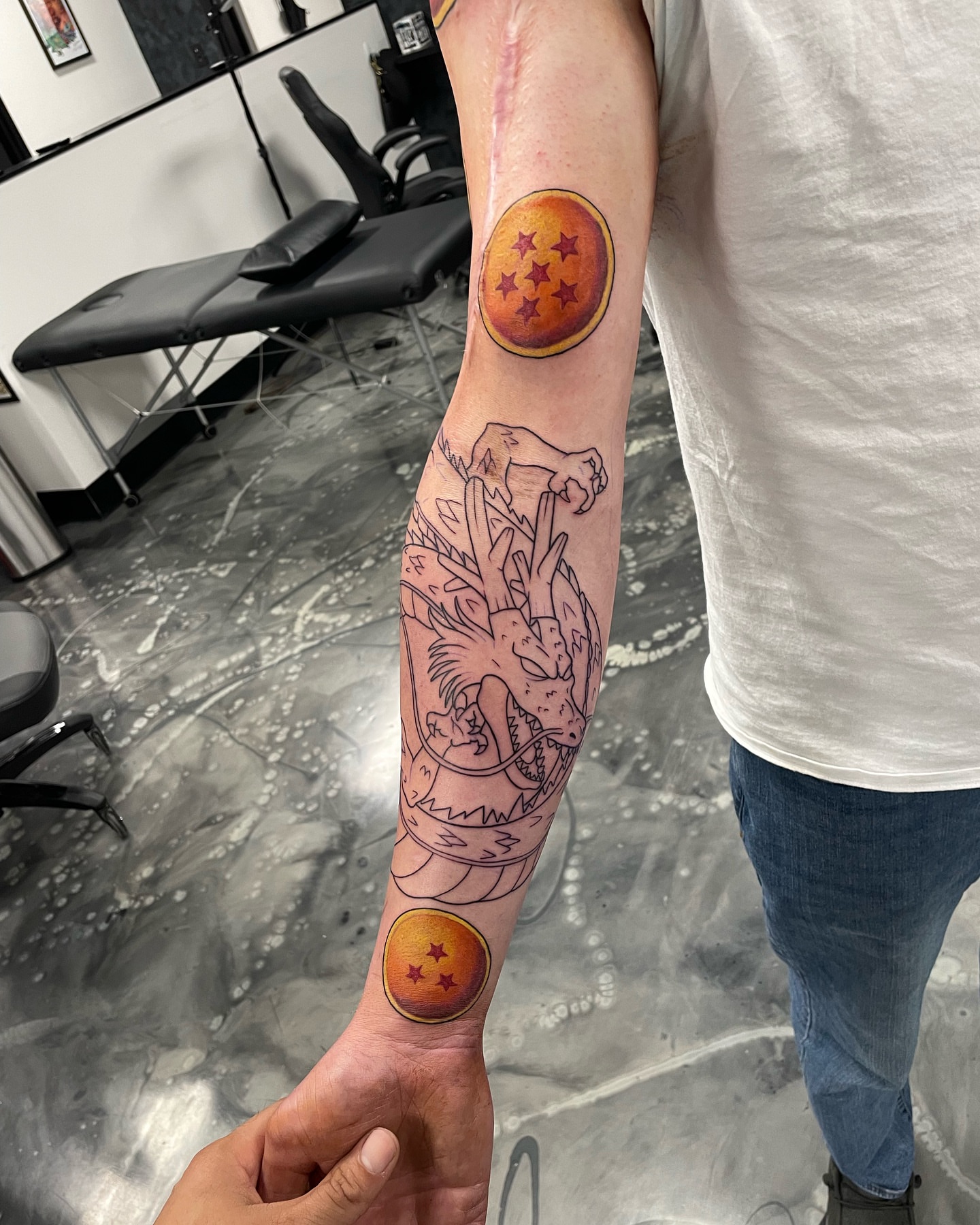 Dragon Ball Z anime tattoo on the forearm by Brandon Anderson