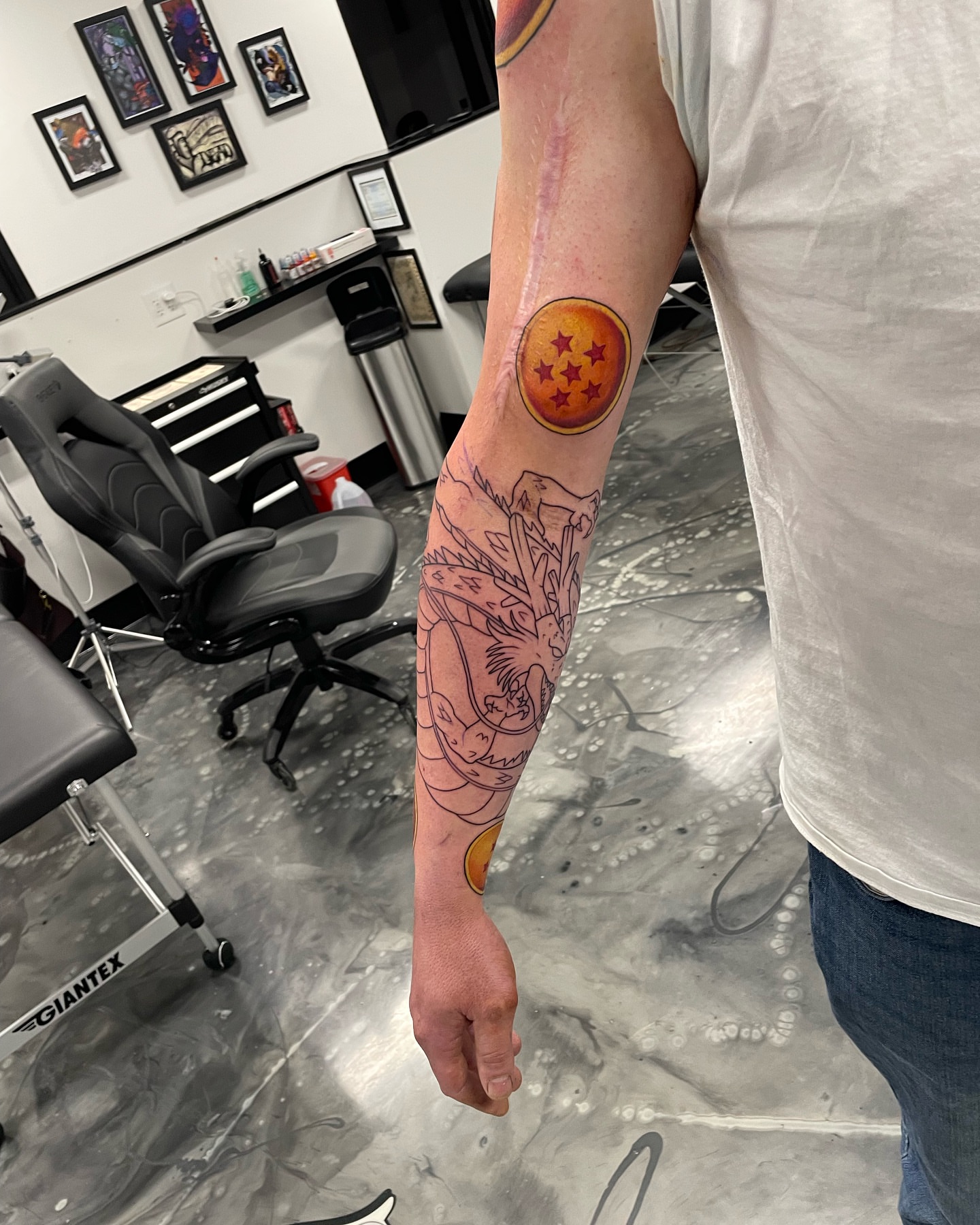 Dragon ball z anime tattoo on the forearm by Brandon Anderson