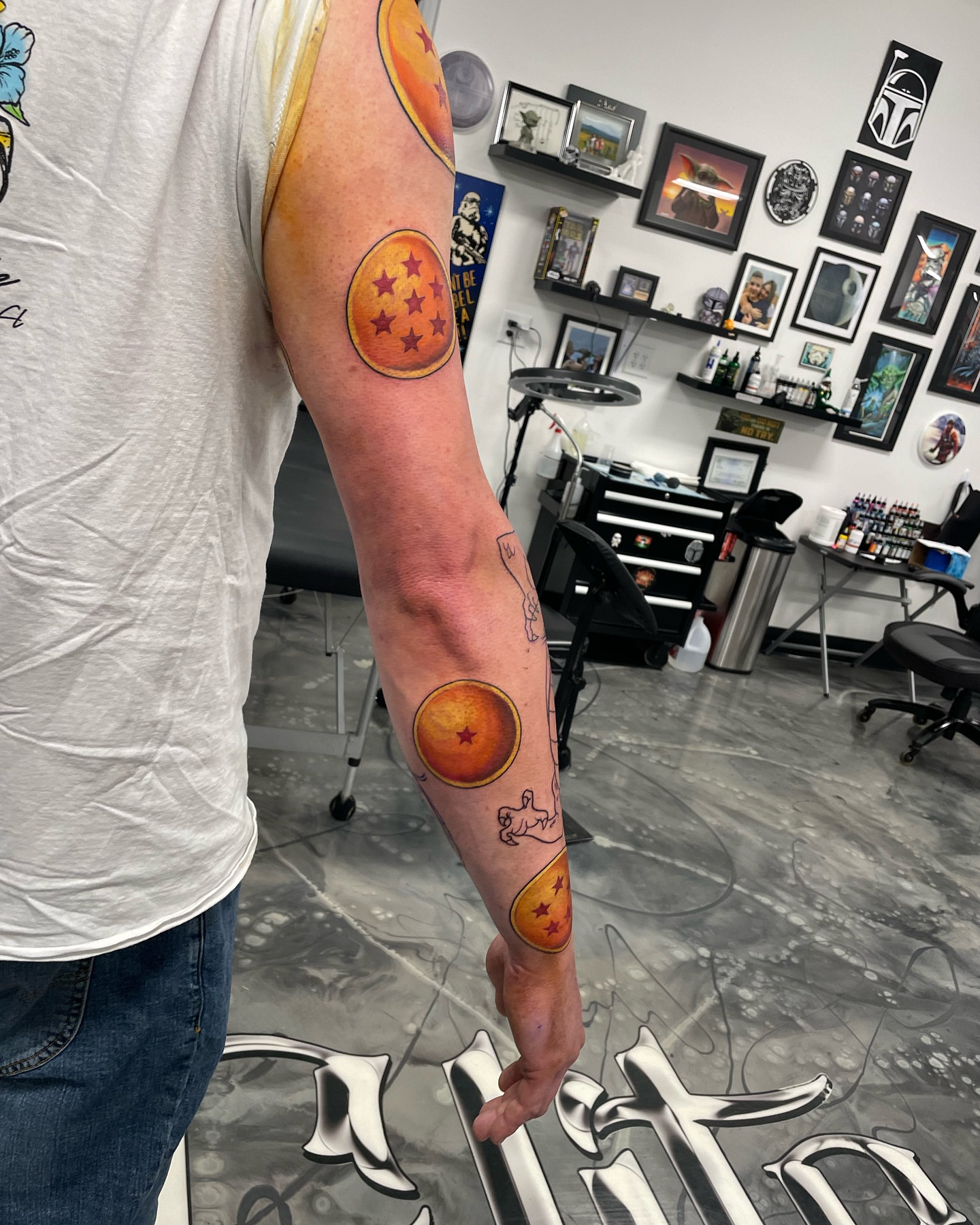 Dragon Ball Z orbs realism tattoo on the forearm by Brandon Anderson
