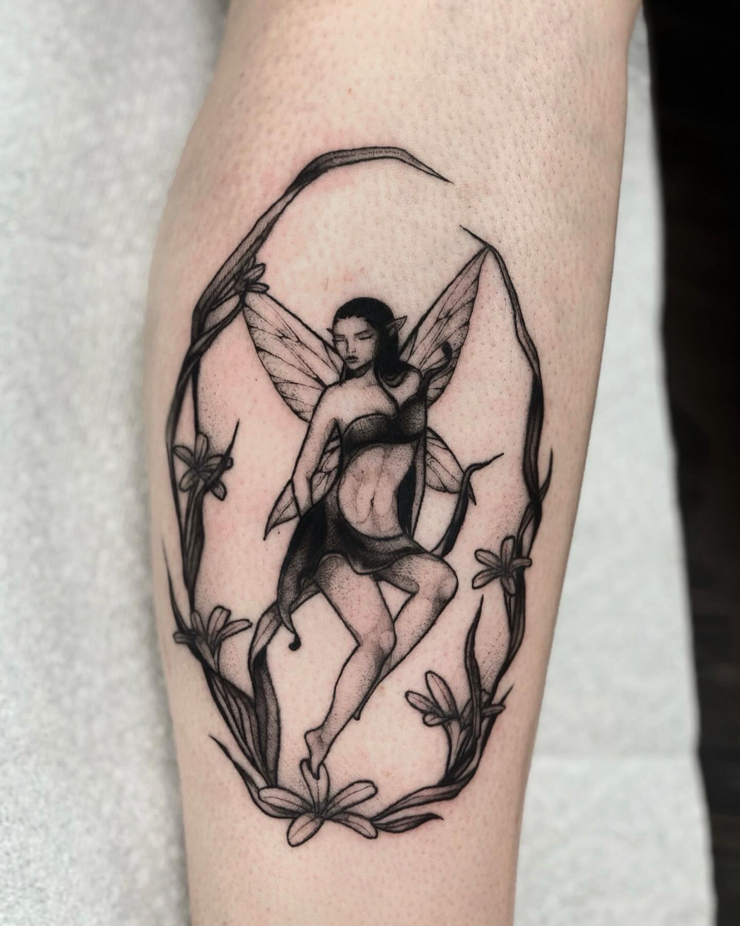 Fairy dotwork tattoo on the forearm by jada