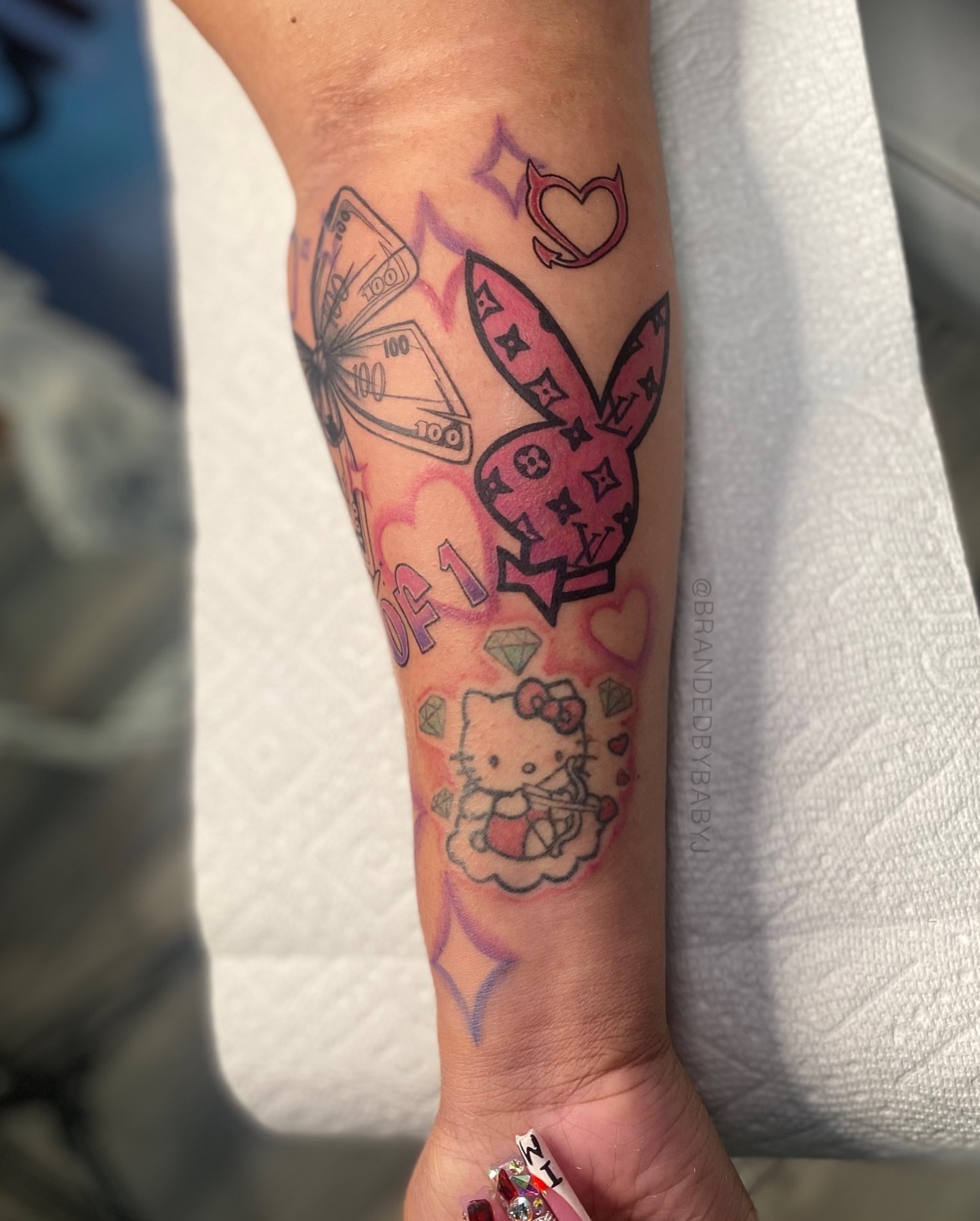 Hello kitty new school tattoo on the forearm by 𝔹𝔸𝔹𝕐 𝕁 ♡, Cincinnati, Ohio