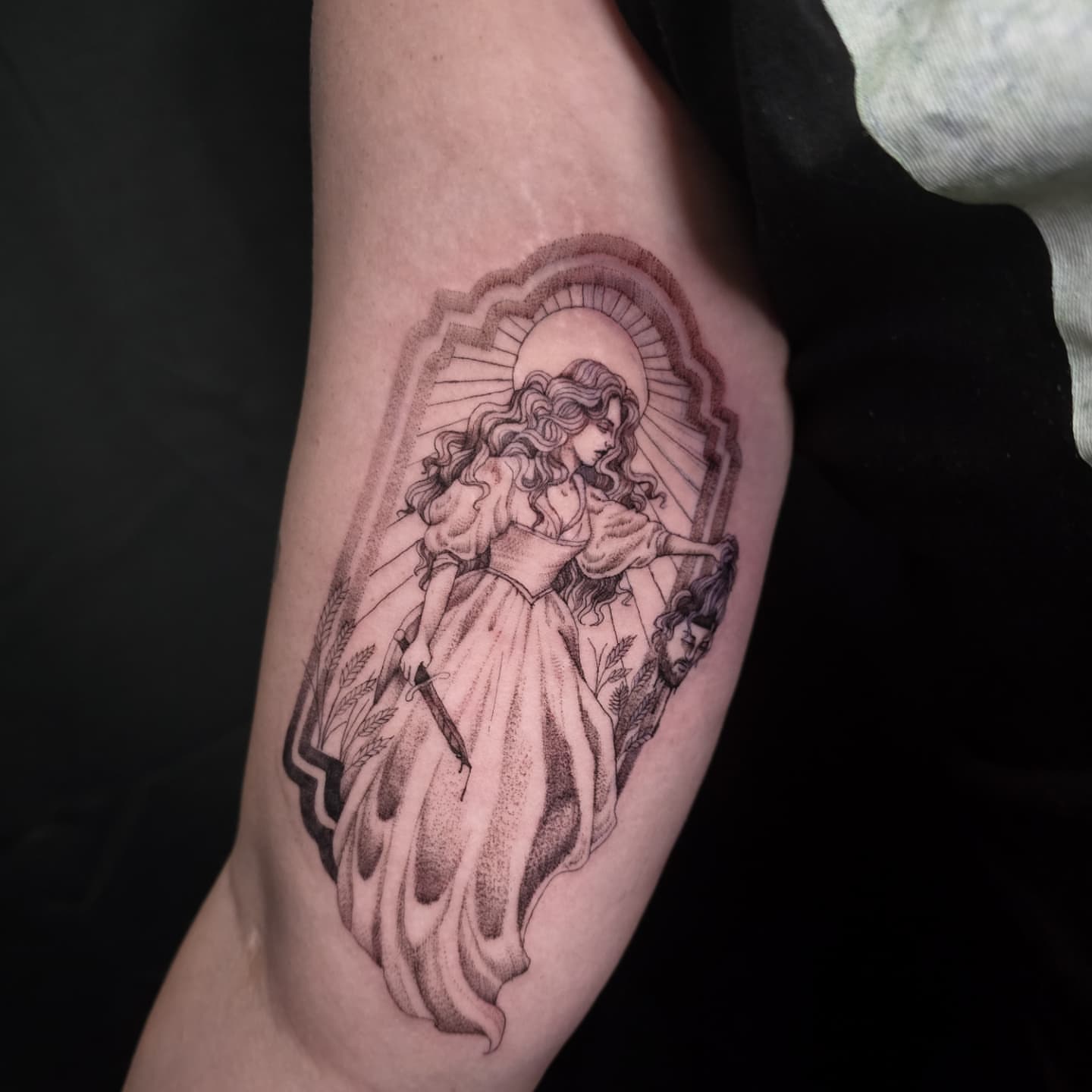 Woman with sword dotwork tattoo on the forearm by Utah Tattoo Artist