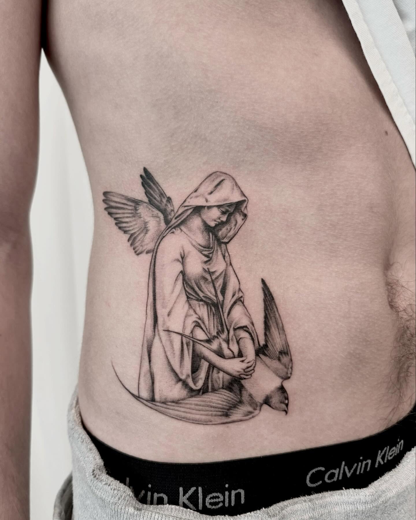 Tattoo by @oori_tattoo — black_and_grey, realism
