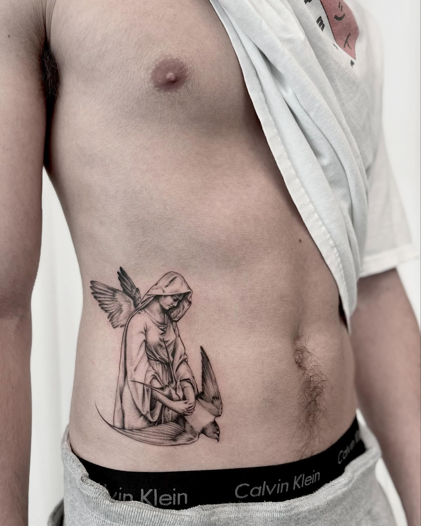 Tattoo by @oori_tattoo — black_and_grey, realism