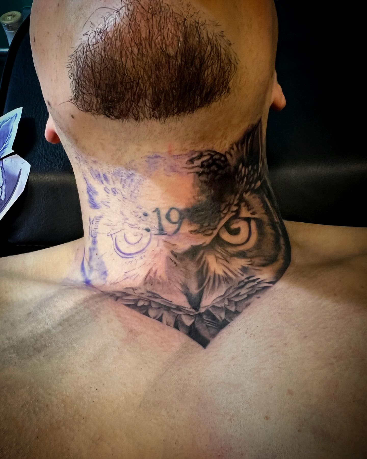 Owl black and grey tattoo on the neck by Avi, Cleveland, Ohio