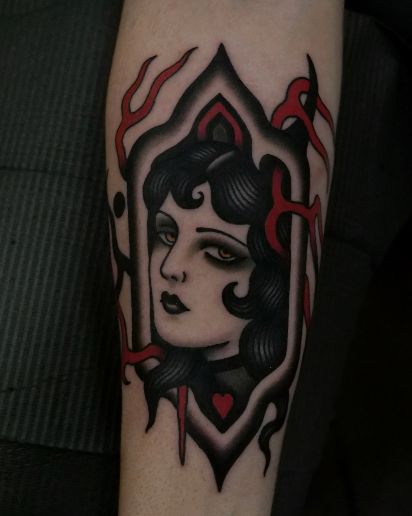 Queen of hearts American traditional tattoo on the forearm by Brandon Murphy