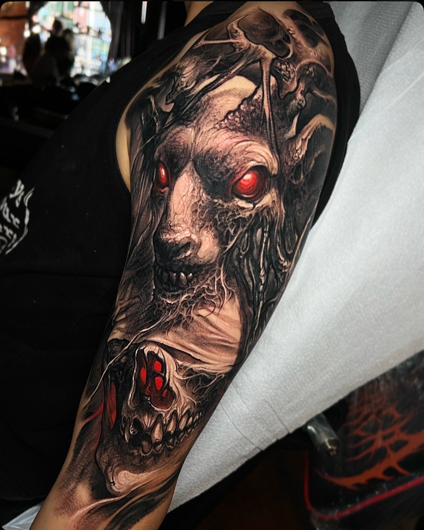 Demon skull dark realism tattoo on the forearm by Brandon Herrera