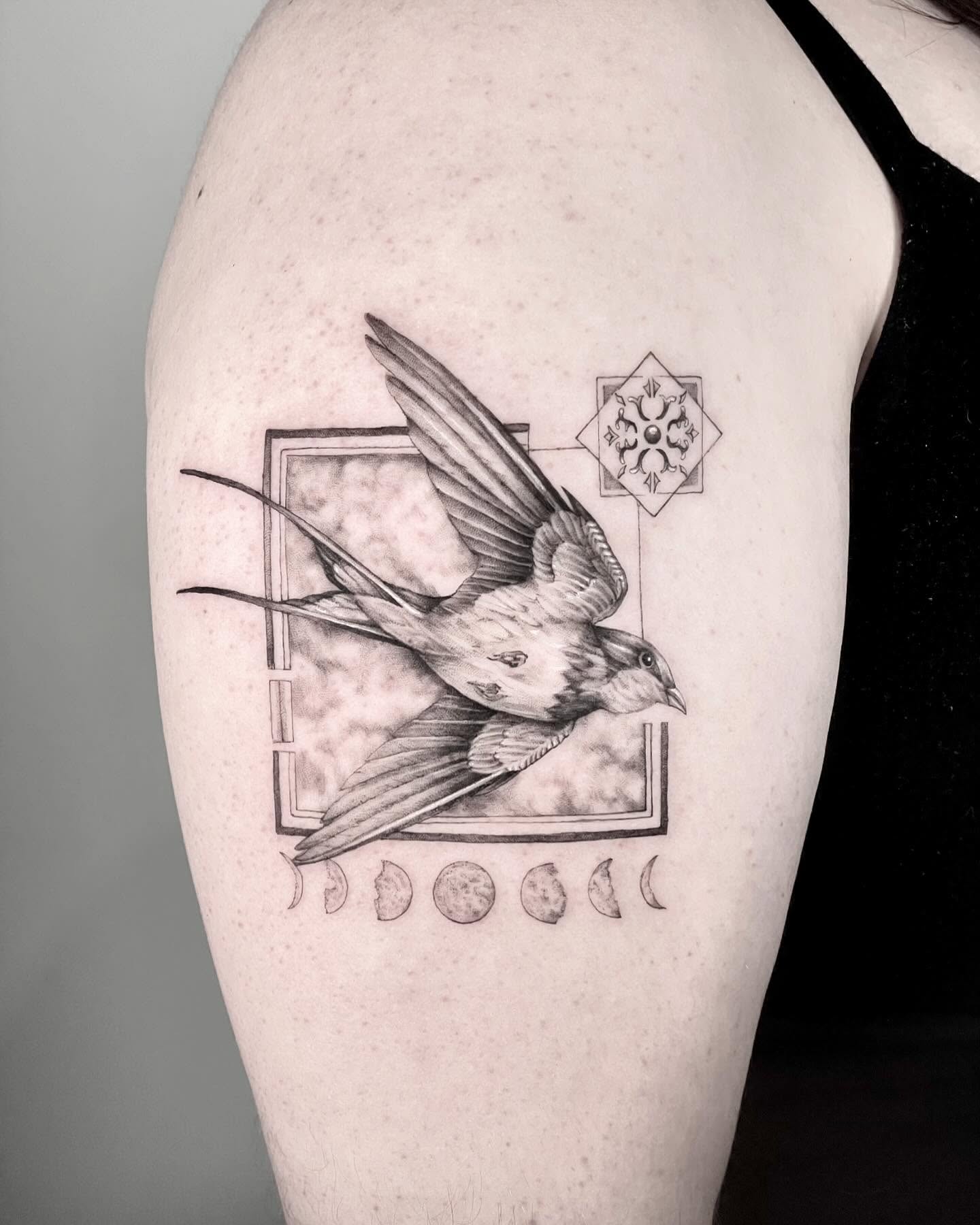 Bird and moon phases realism tattoo on the upper arm by eugene k 🌈, San Francisco, California
