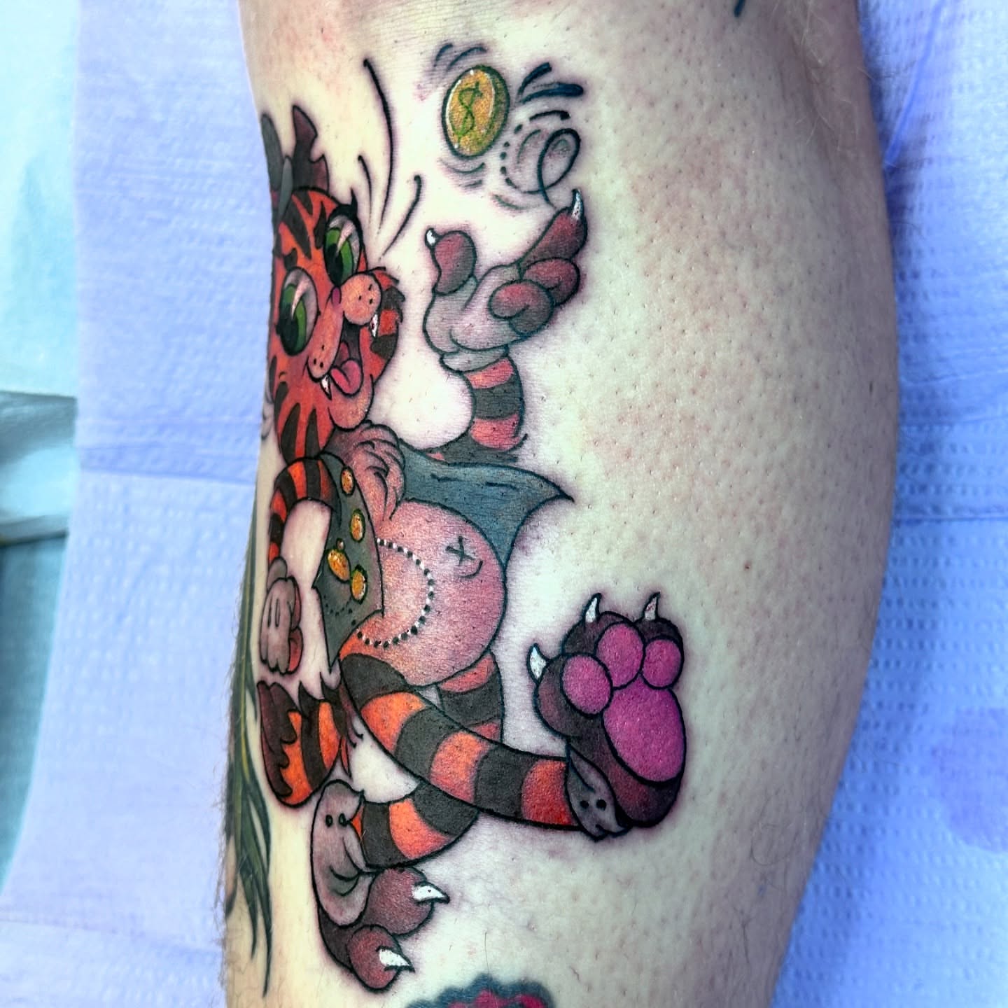Snake and cat American traditional tattoo on the forearm by 𝙹𝚎𝚗 ♡︎