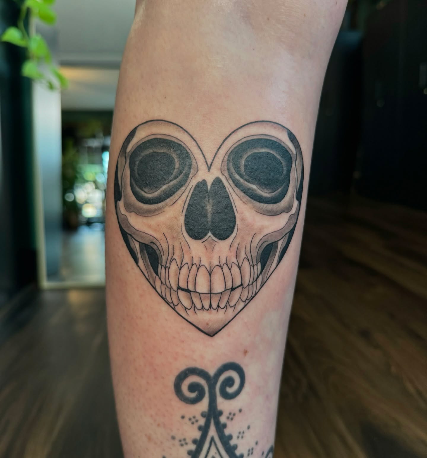 Skull black and grey tattoo on the forearm by Chelsea Youngblood, Seattle, Washington